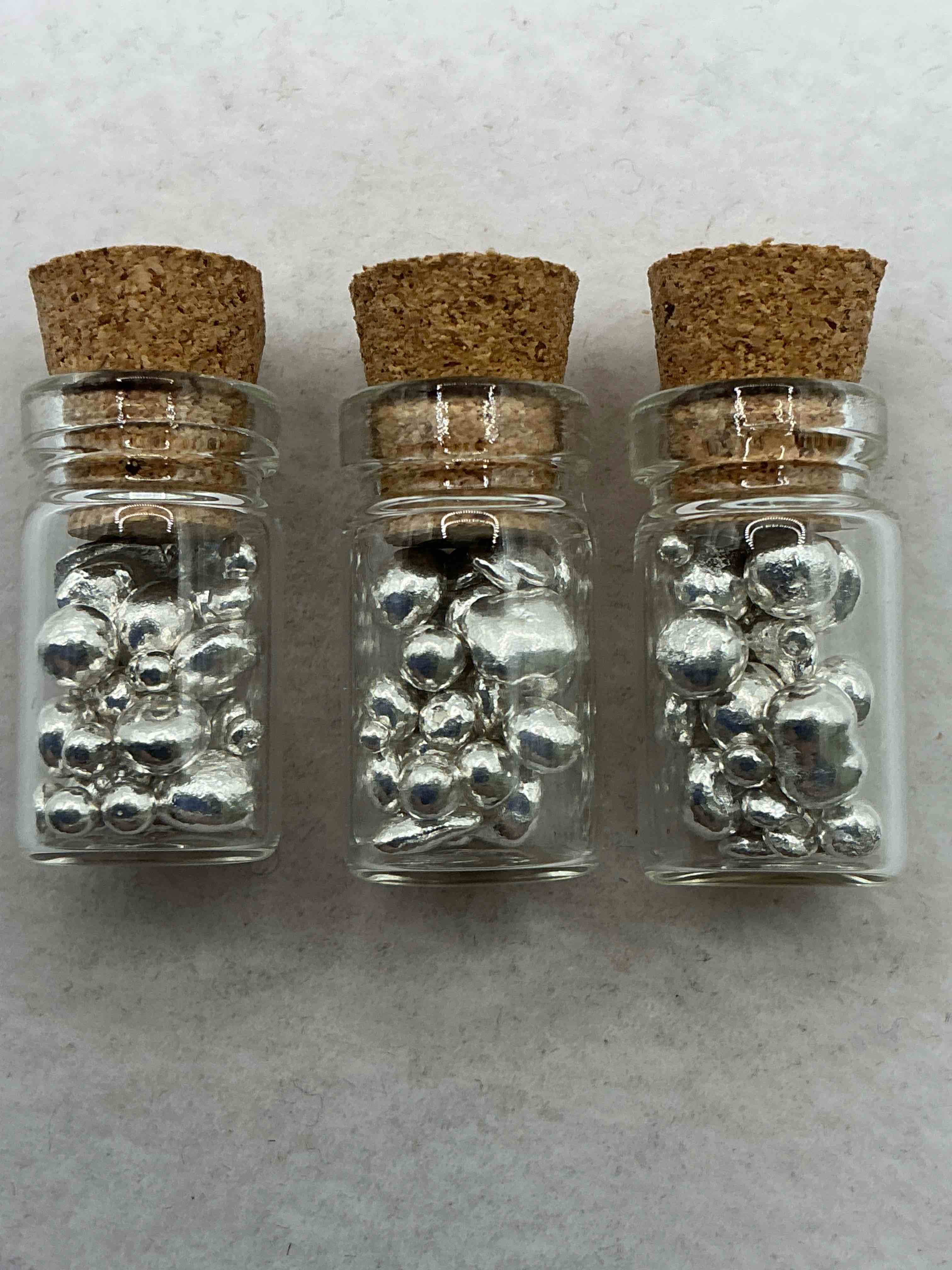 Condition photo showing Good Condition for silver nuggets! .999 us fine silver, in small nugget form! total weight of all nuggets in lot approximately 9 grams, bid is per nugget! a cool way to invest in fine us silver! includes collector capsule!