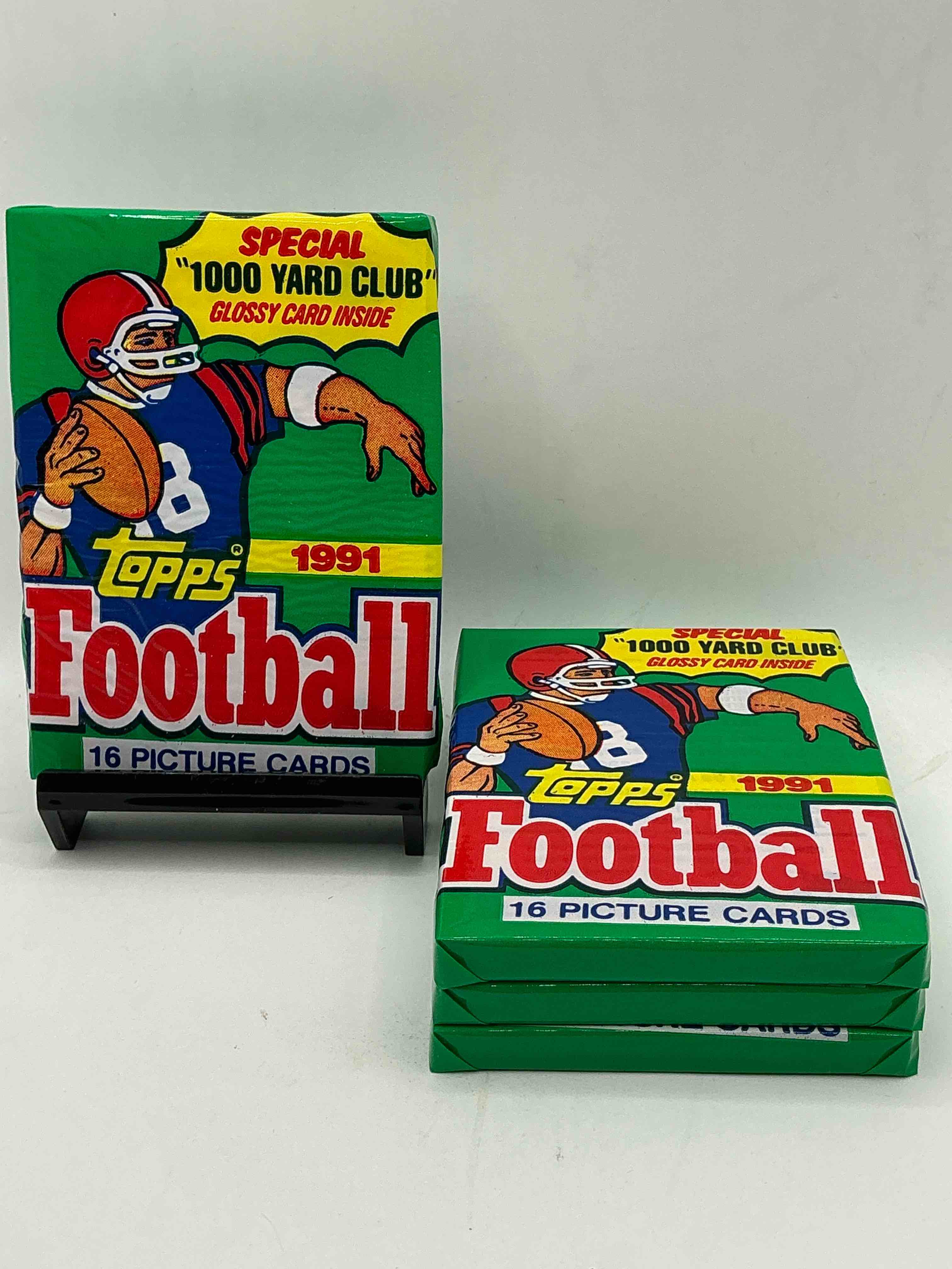 1991 topps football unopened sports card pack, direct from original retail case. search for early barry sanders, emmitt smith, jerry rice & joe montana!