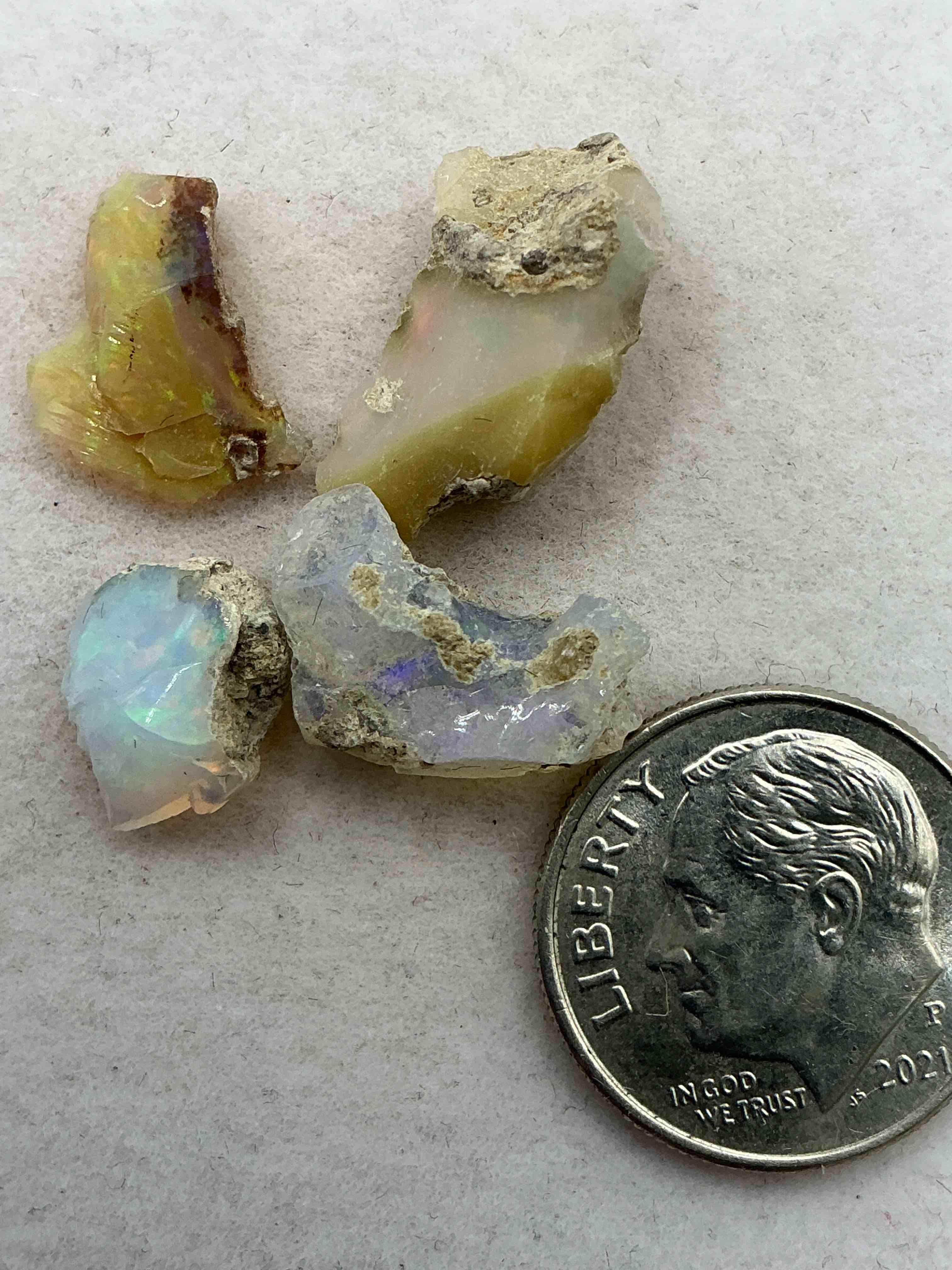 opal precious gemstone, authentic! opal gemstone, cut and/or faceted & polished! opals are famous for their. stunning clarity & hues & likely originate from ethiopia. opals are believed to promote hope, purity & love. the u.s. dime in image is for size reference only (not included). own an amazing, stunning, unique opal gemstone!