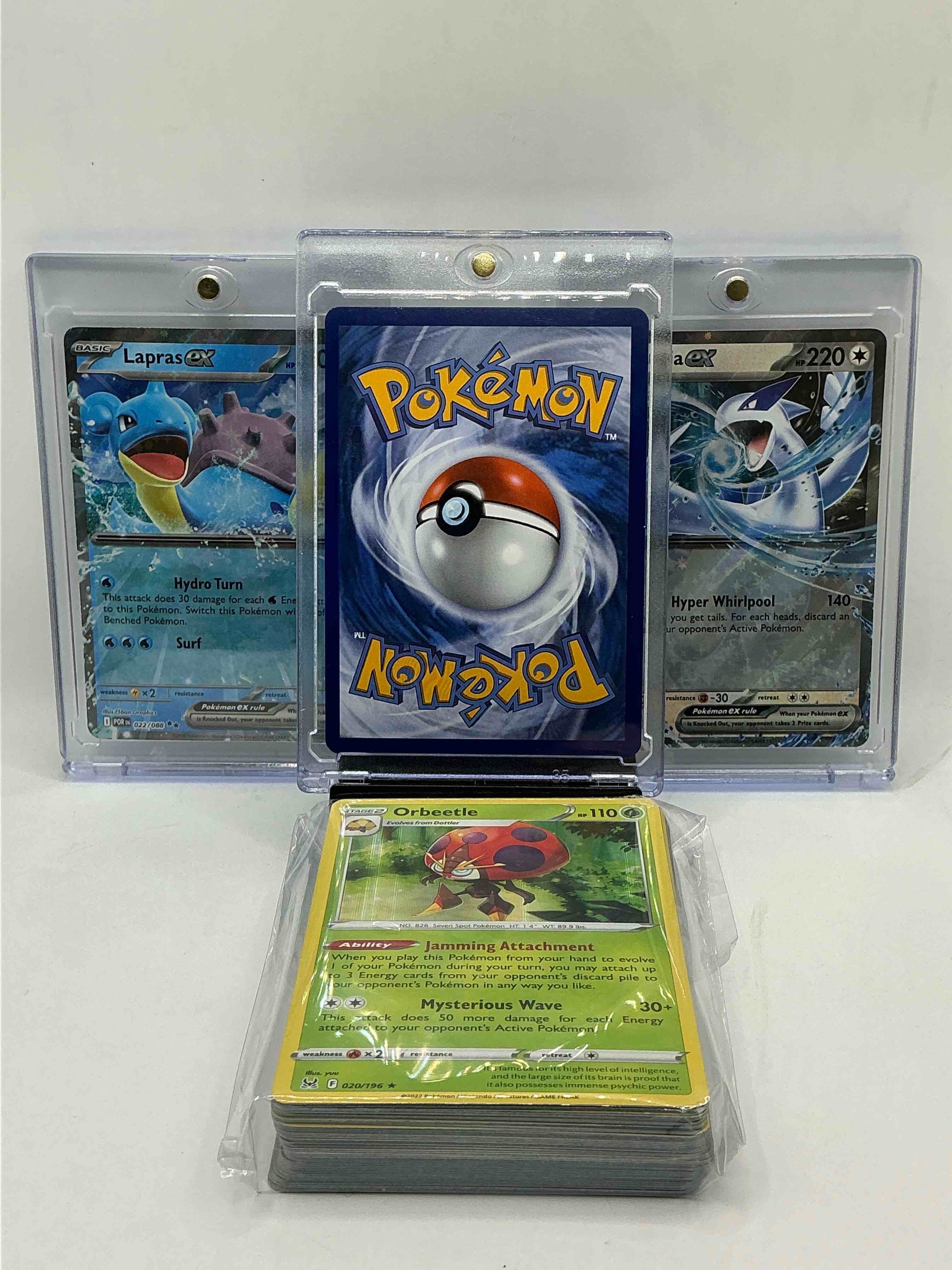 Condition photo showing New/Like New for pokémon jackpot! ceritan ex! lapras ex! lugia ex! along with 50 other pokémon heroes, holos, legends & commons- including holographic cards, stage 2 cards, holos in all forms & more! also includes 36 non holo common/ uncommon basic & first stage cards trainers & energy too! perfect set for collectors & enthusiasts!