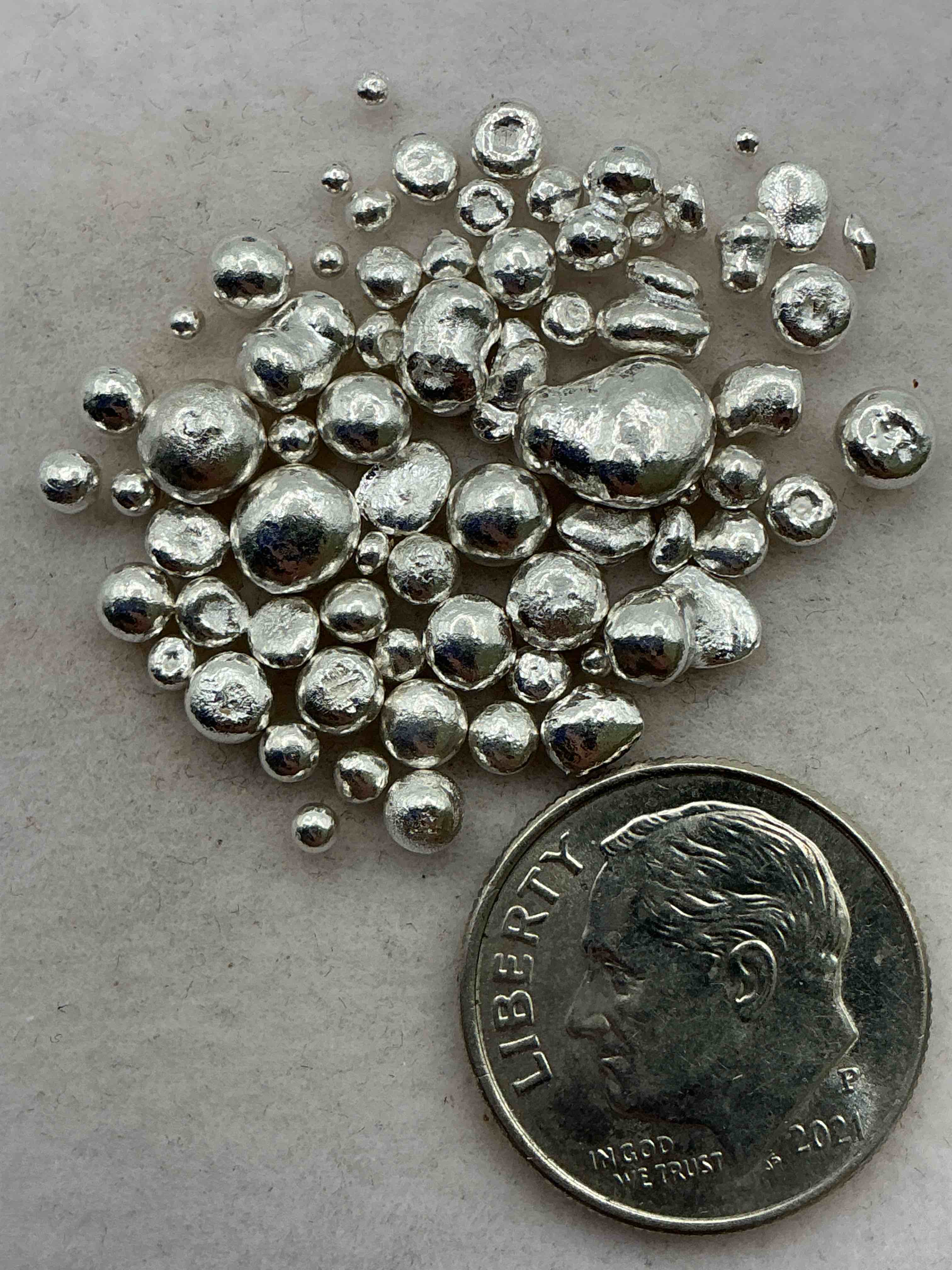 Condition photo showing Good Condition for silver nuggets! .999 us fine silver, in small nugget form! total weight of all nuggets in lot approximately 9 grams, bid is per nugget! a cool way to invest in fine us silver! includes collector capsule!