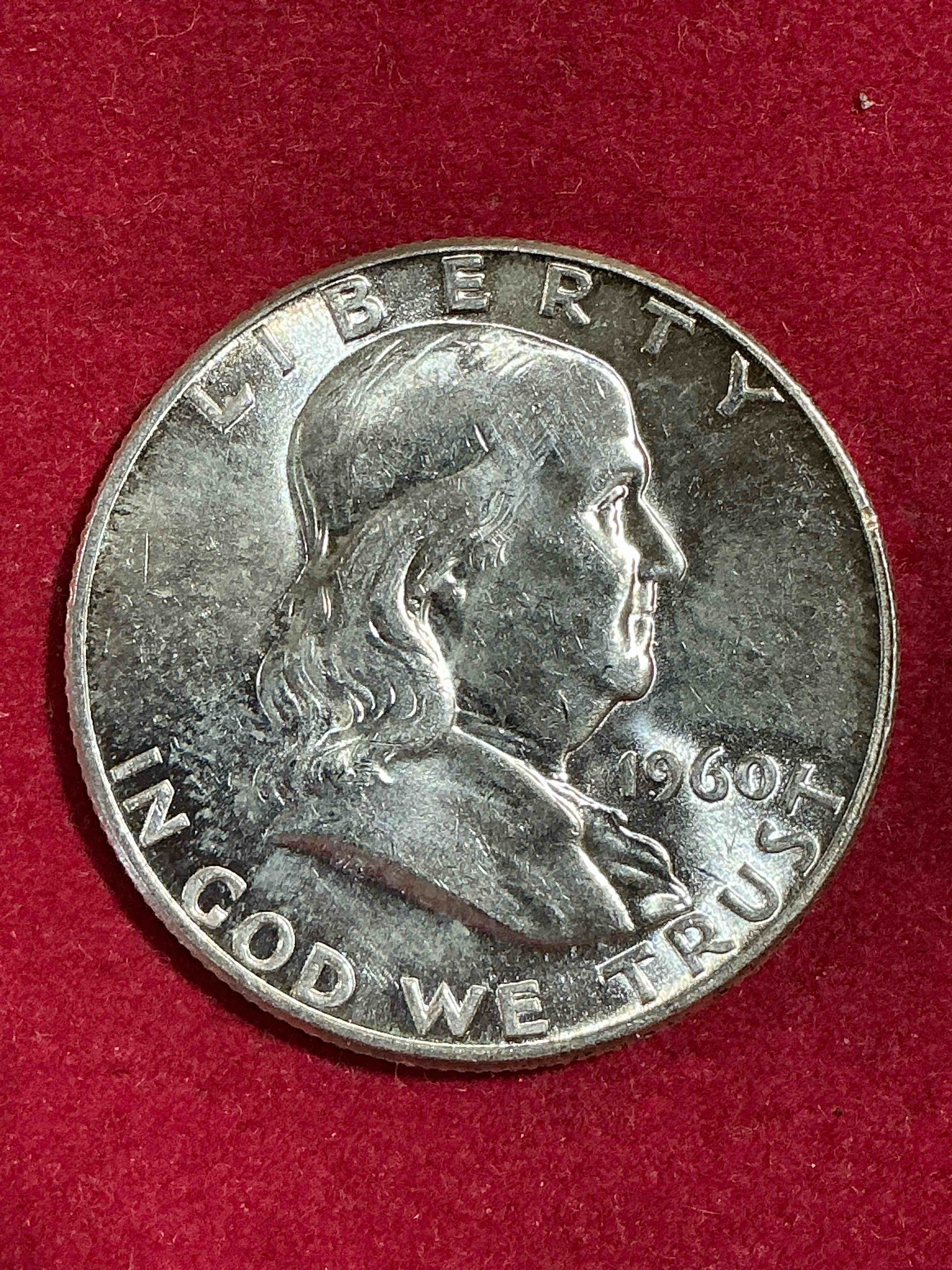 ben franklin silver! pre 1965 silver u.s. half dollar coin- appears uncirculated! before 1965 american half dollars were actually silver, here is a rare 1960 version in good condition! great for investing in precious metals! these heavy half dollars were minted at 90% silver and 10% copper, giving them a net weight of .36169 ounces of pure silver per coin! very rare in this great condition!