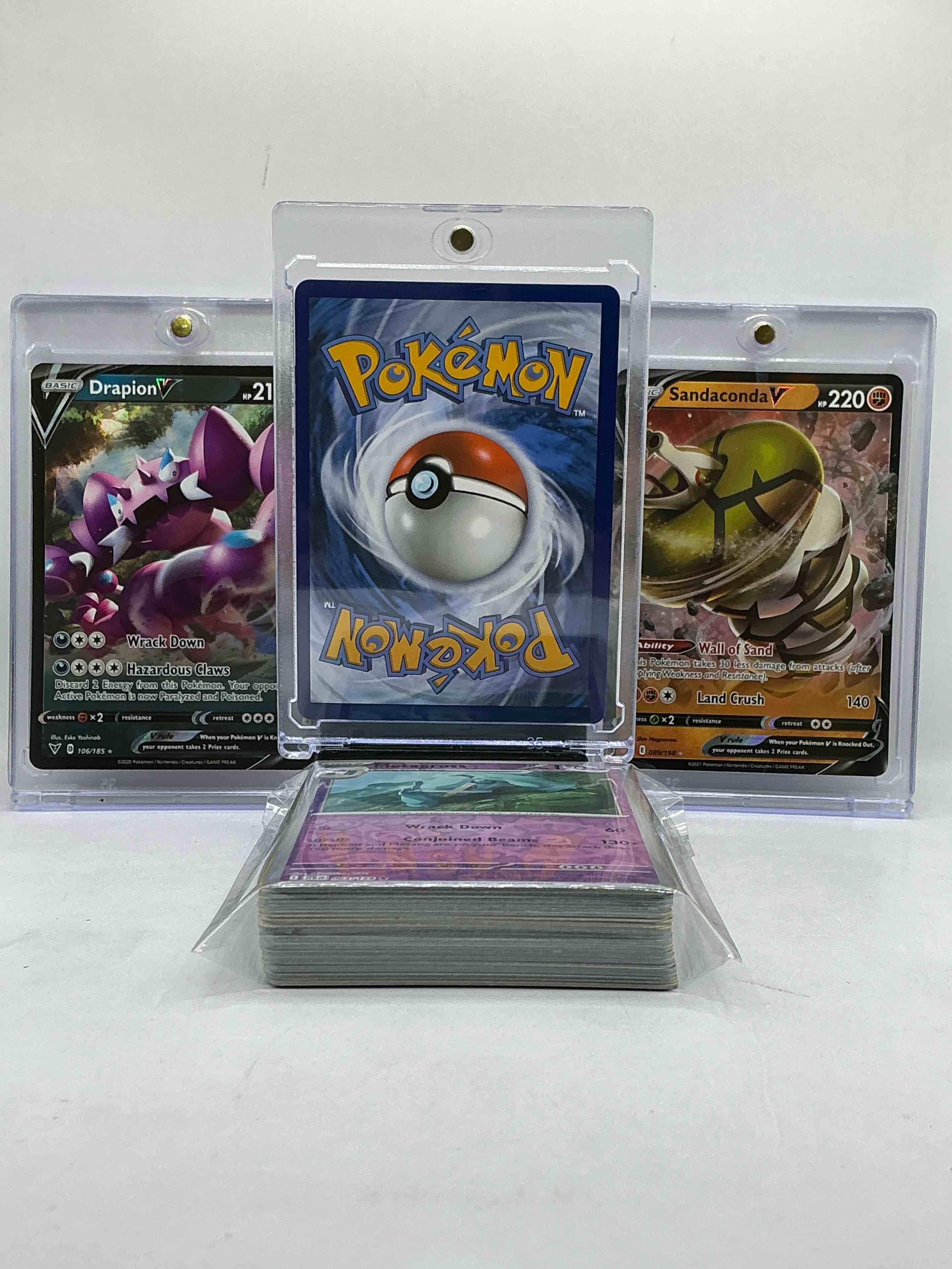 Condition photo showing New/Like New for charizard v, sandaconda v, drapion v & more! insane trio! along with 50 other pokémon heroes, holos, legends & commons- including holographic cards, stage 2 cards, holos in all forms & more! also includes 36 non holo common/ uncommon basic & first stage cards trainers & energy too! perfect set for collectors & enthusiasts!