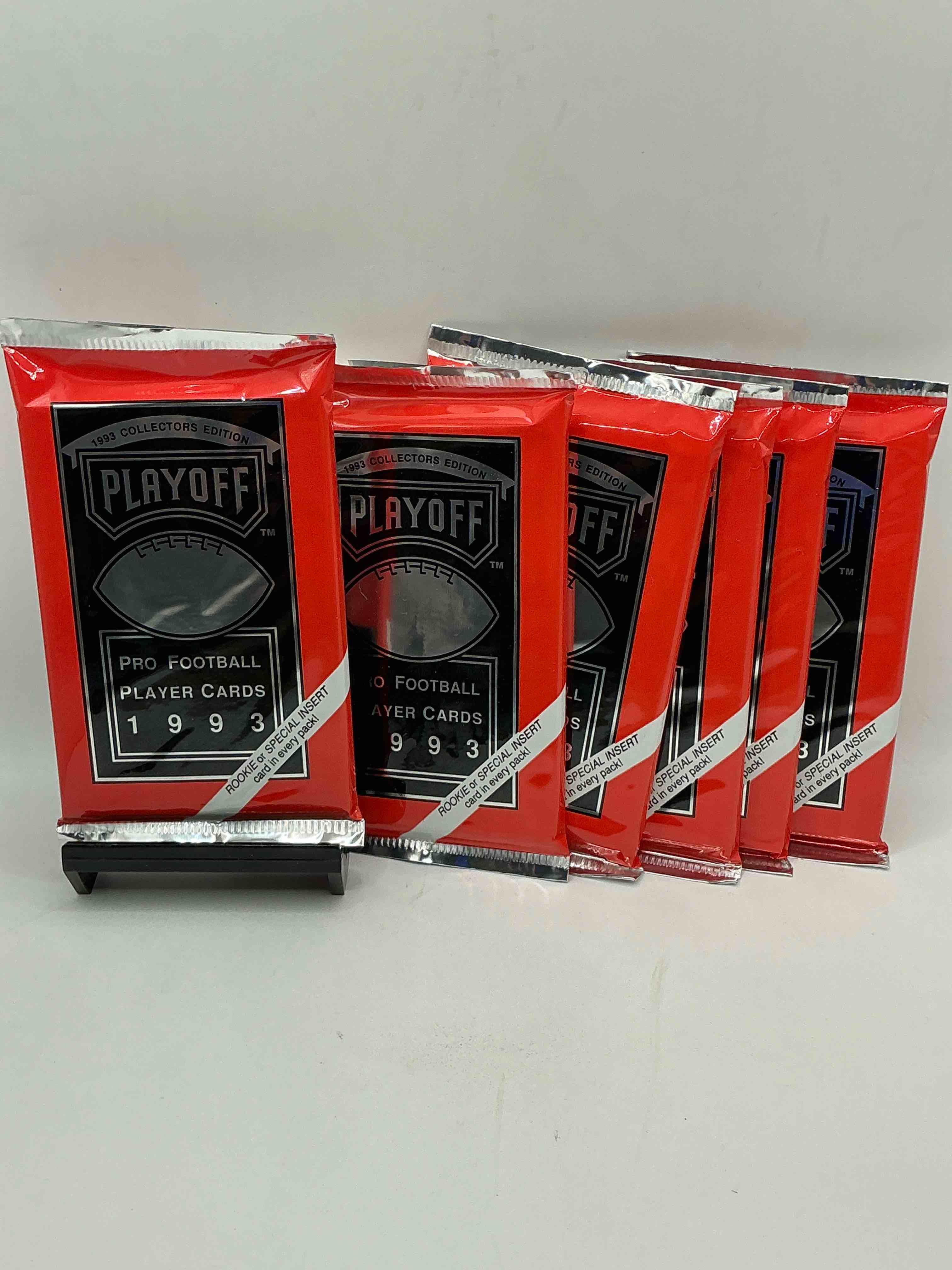 beautiful & super rare 1993 playoff football unopened packs, direct from chrome display box! these packs have at least one special insert or rookie in each pack! search for troy aikman, emmitt smith, barry sanders, jerry rice & more!