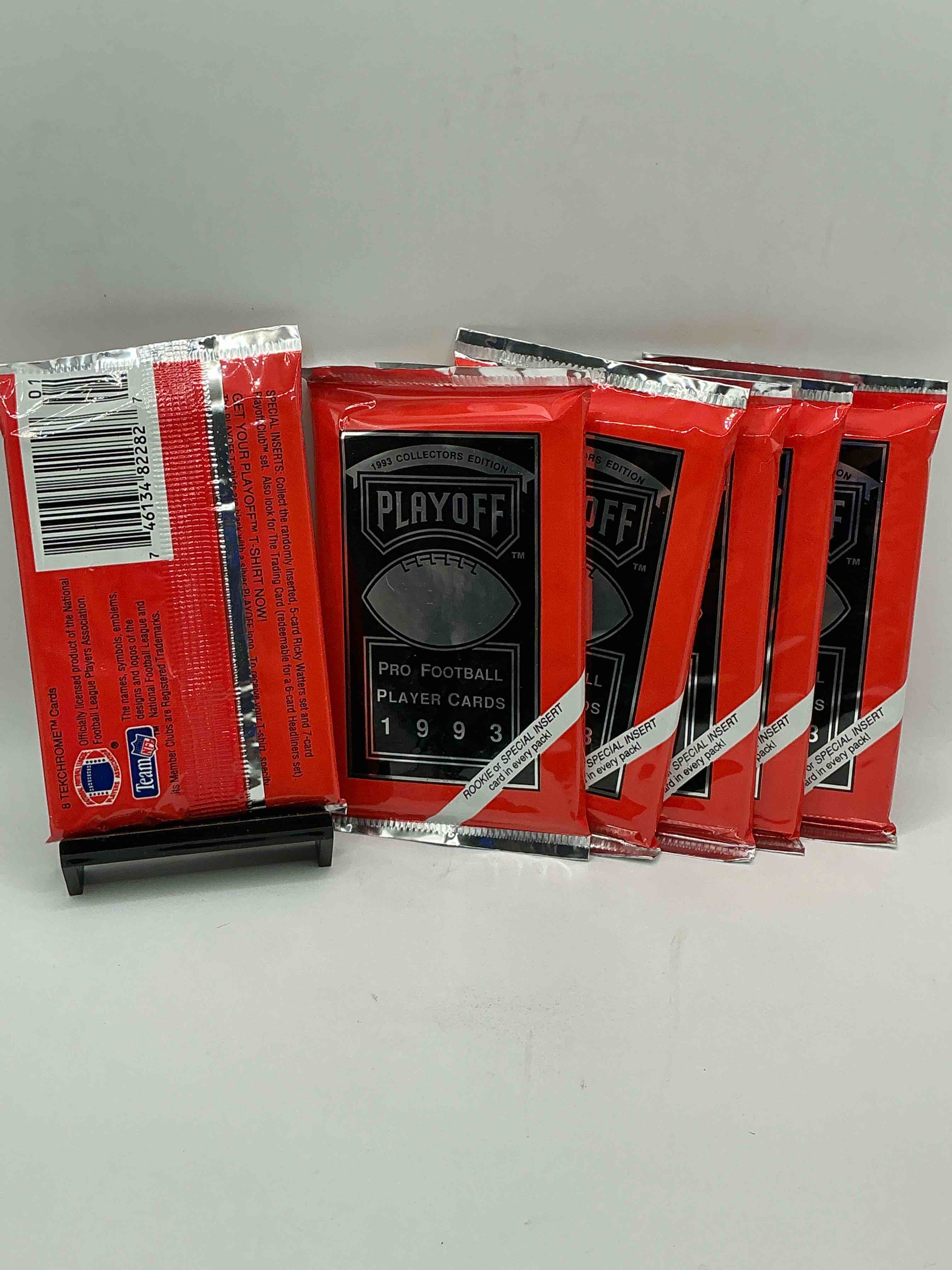 Condition photo showing New/Like New for beautiful & super rare 1993 playoff football unopened packs, direct from chrome display box! these packs have at least one special insert or rookie in each pack! search for troy aikman, emmitt smith, barry sanders, jerry rice & more!