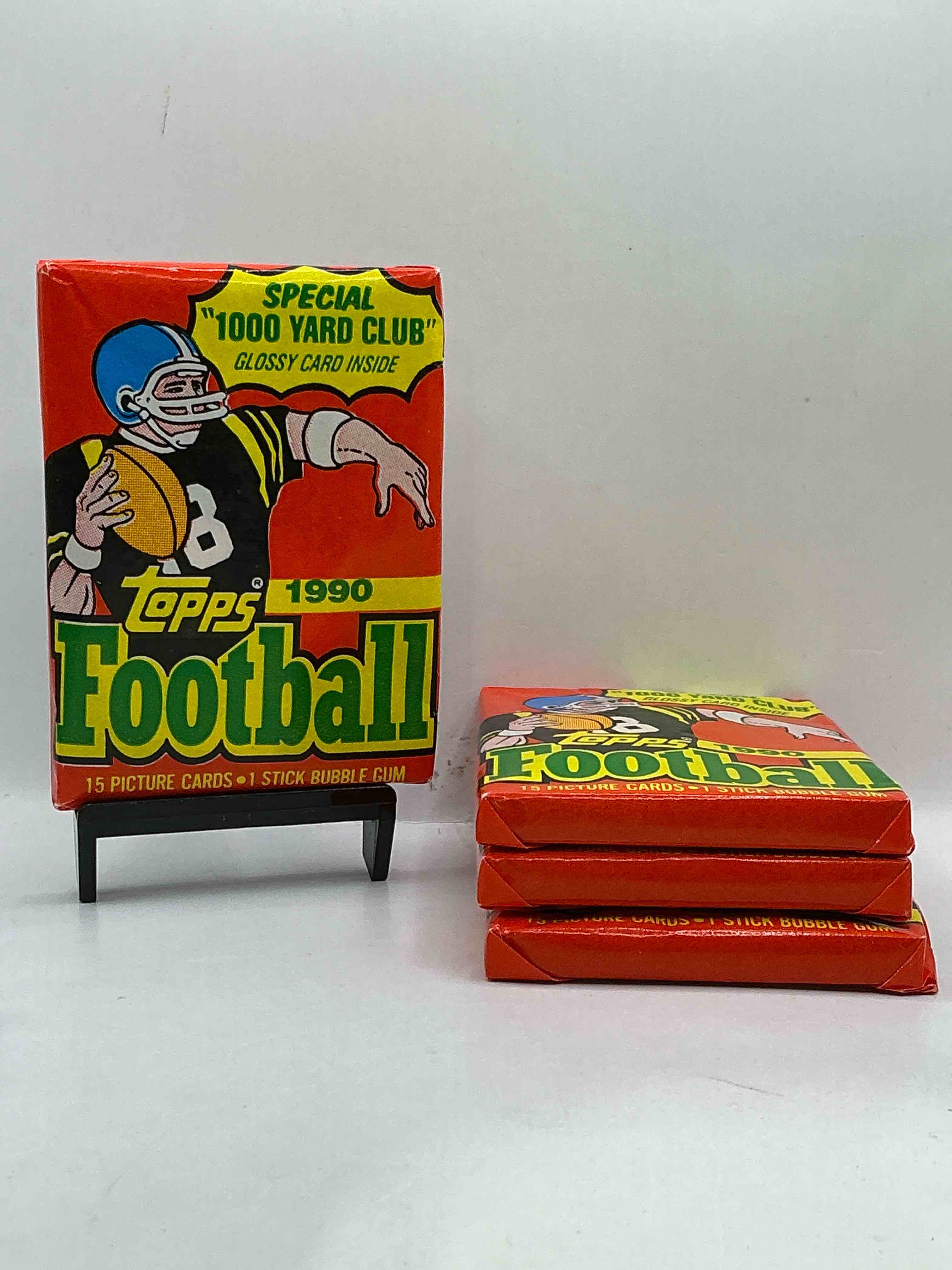 the last year of football wax! joe montana, emmitt smith & barry sanders!? 1990 topps football unopened sports card wax pack, direct from original retail box! getting hard to find! search for early barry sanders & jerry rice & so much more!