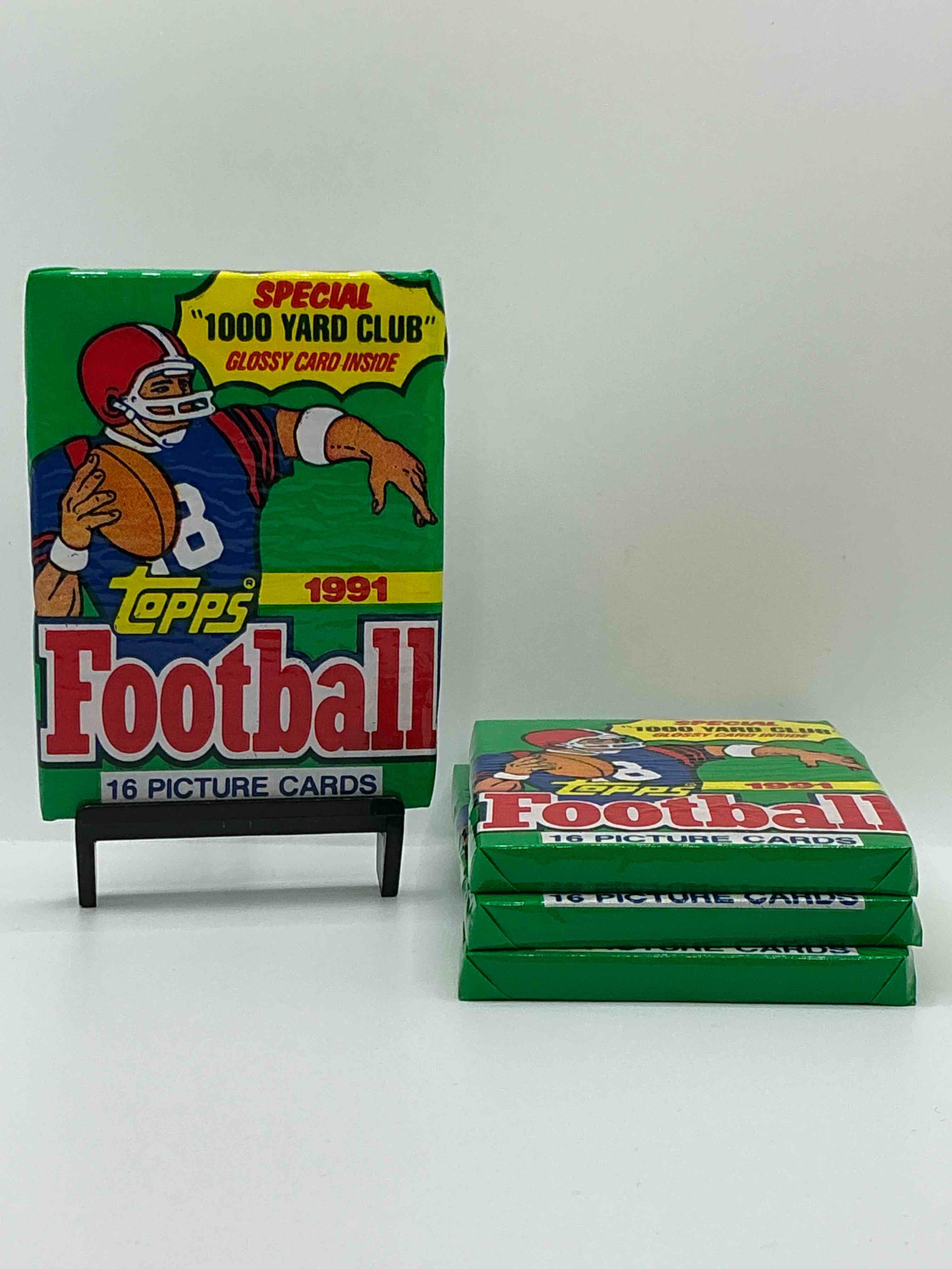 1991 topps football unopened sports card pack, direct from original retail case. search for early barry sanders, emmitt smith, jerry rice & joe montana!