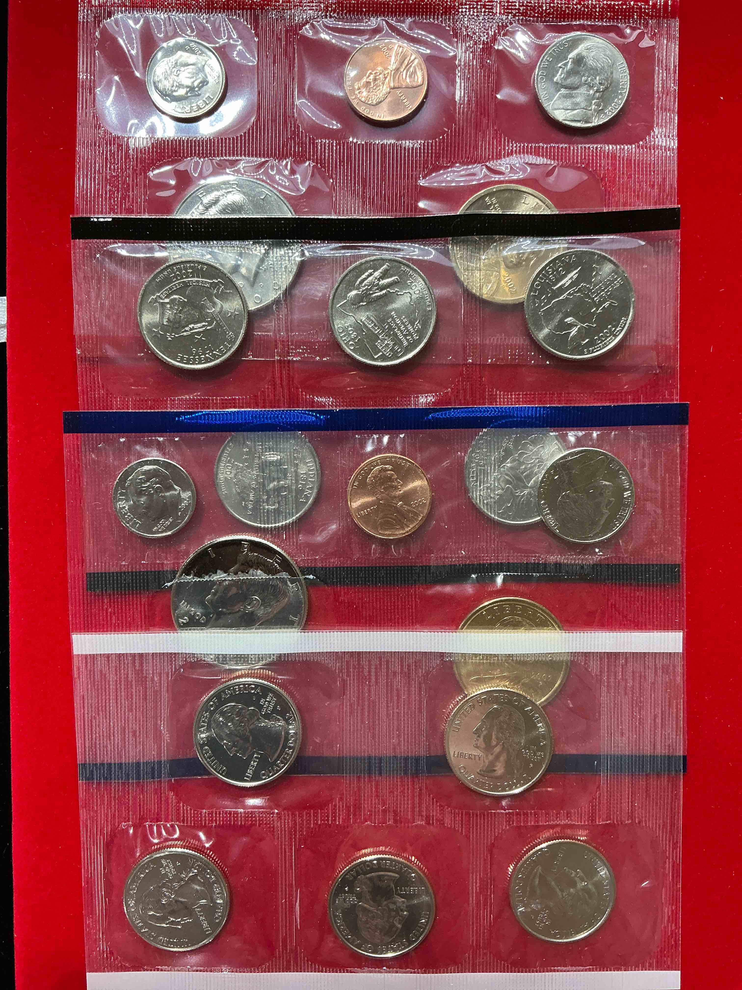 2002 uncirculated mint coins! 20 coins from philadelphia & denver! 20 coin uncirculated lot, with state quarters, nickels, half dollars, dimes, pennies & more! uncirculated coin craziness!