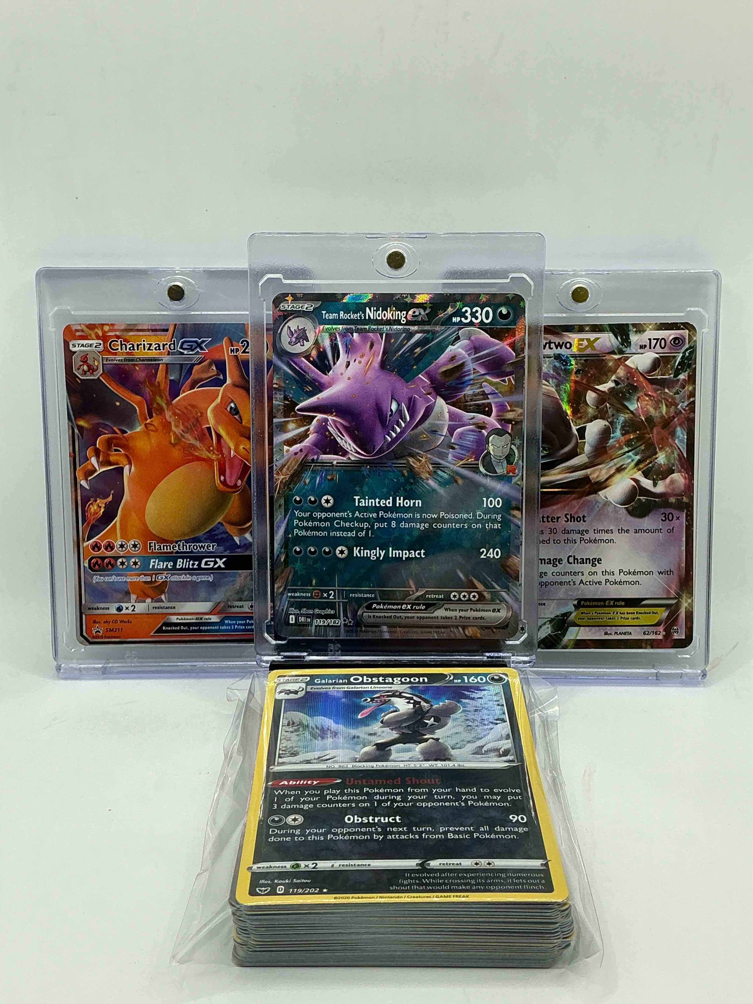 Nidoking EX! Mewtwo EX! Charizard GX! Along With 50 Other Pokémon Heroes, Holos, Legends & Commons- Including Holographic Cards, Stage 2 Cards, Holos In All Forms & More! Also Includes 36 Non Holo Common/ Uncommon Basic & First Stage Cards Trainers & Energy Too! Perfect Set For Collectors & Enthusiasts!