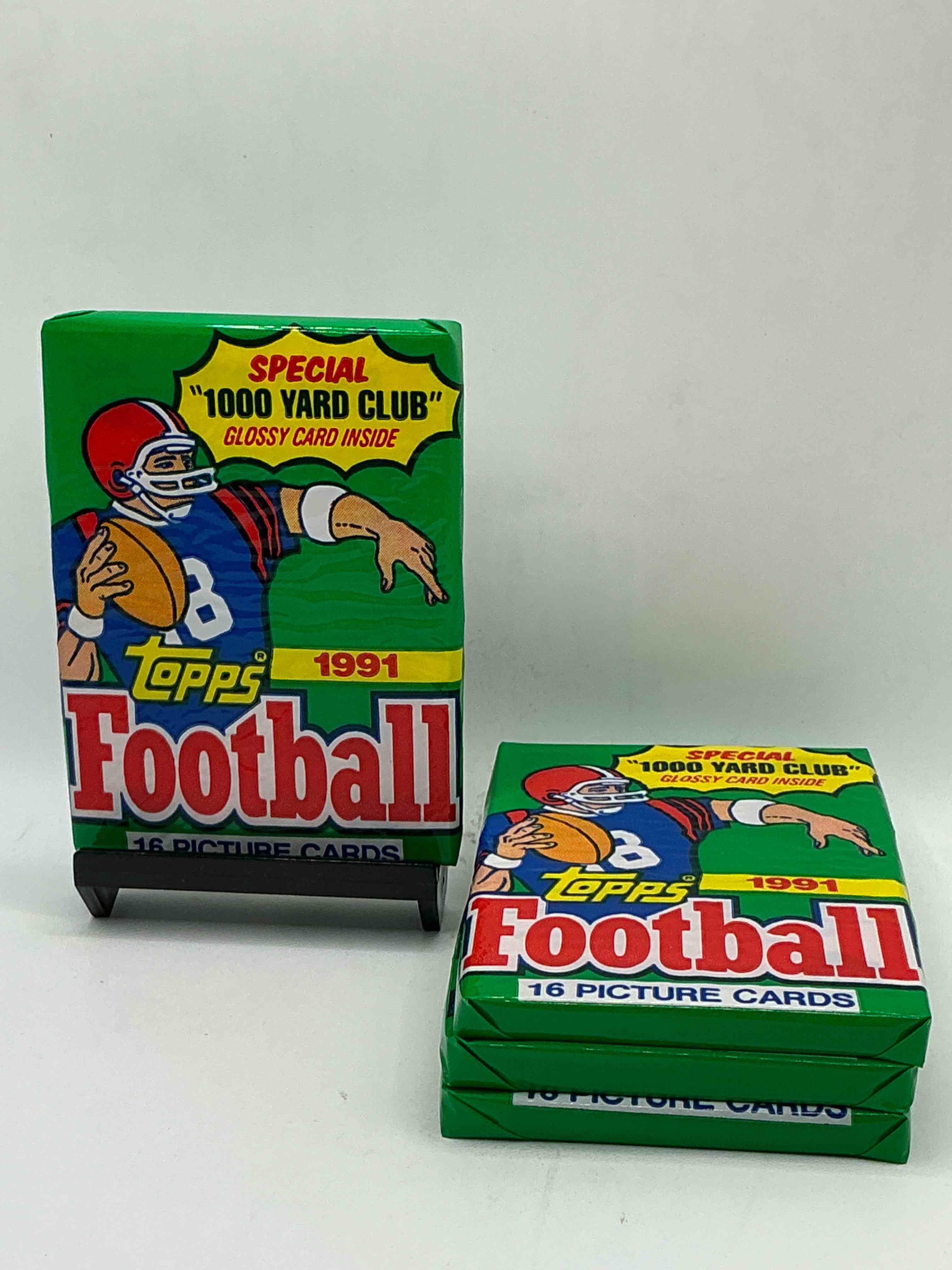 1991 topps football unopened sports card pack, direct from original retail case. search for early barry sanders, emmitt smith, jerry rice & joe montana!
