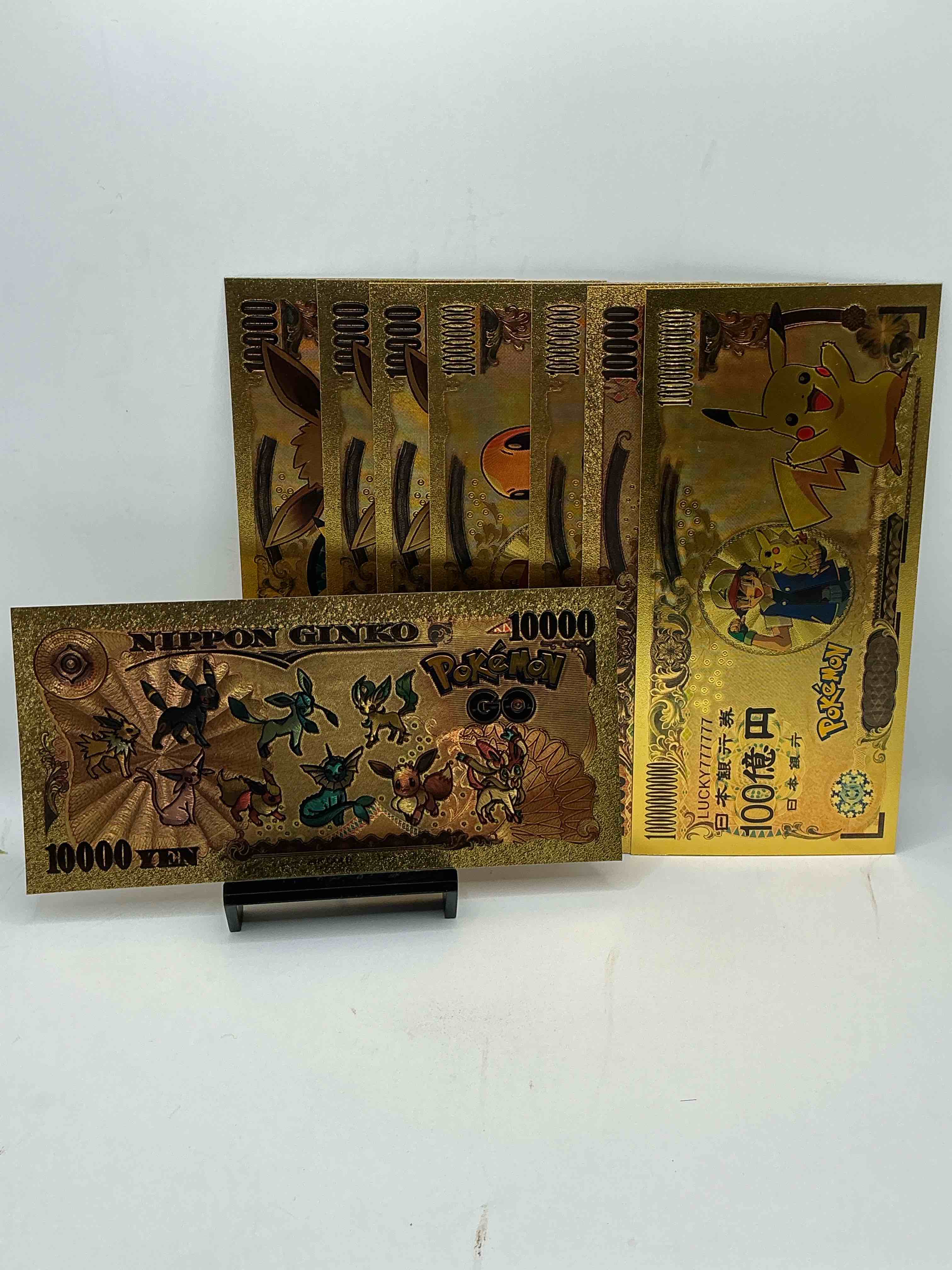 Condition photo showing New/Like New for pokémon novelty gold in this color dollars! ultra cool novelty 10,000 pokémon bill with characters & cool designs! rare & hard to get! 