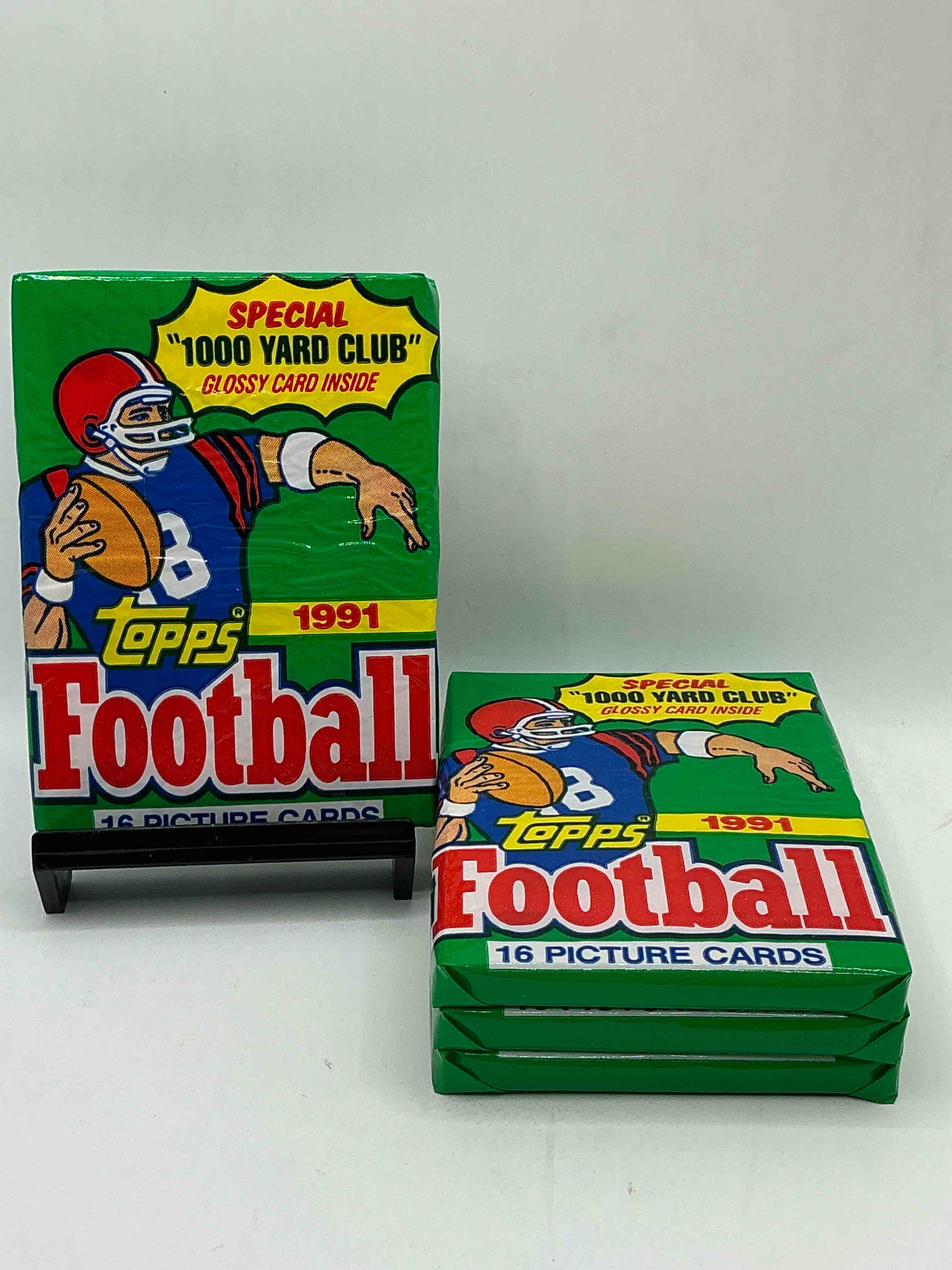 1991 topps football unopened sports card pack, direct from original retail case. search for early barry sanders, emmitt smith, jerry rice & joe montana!