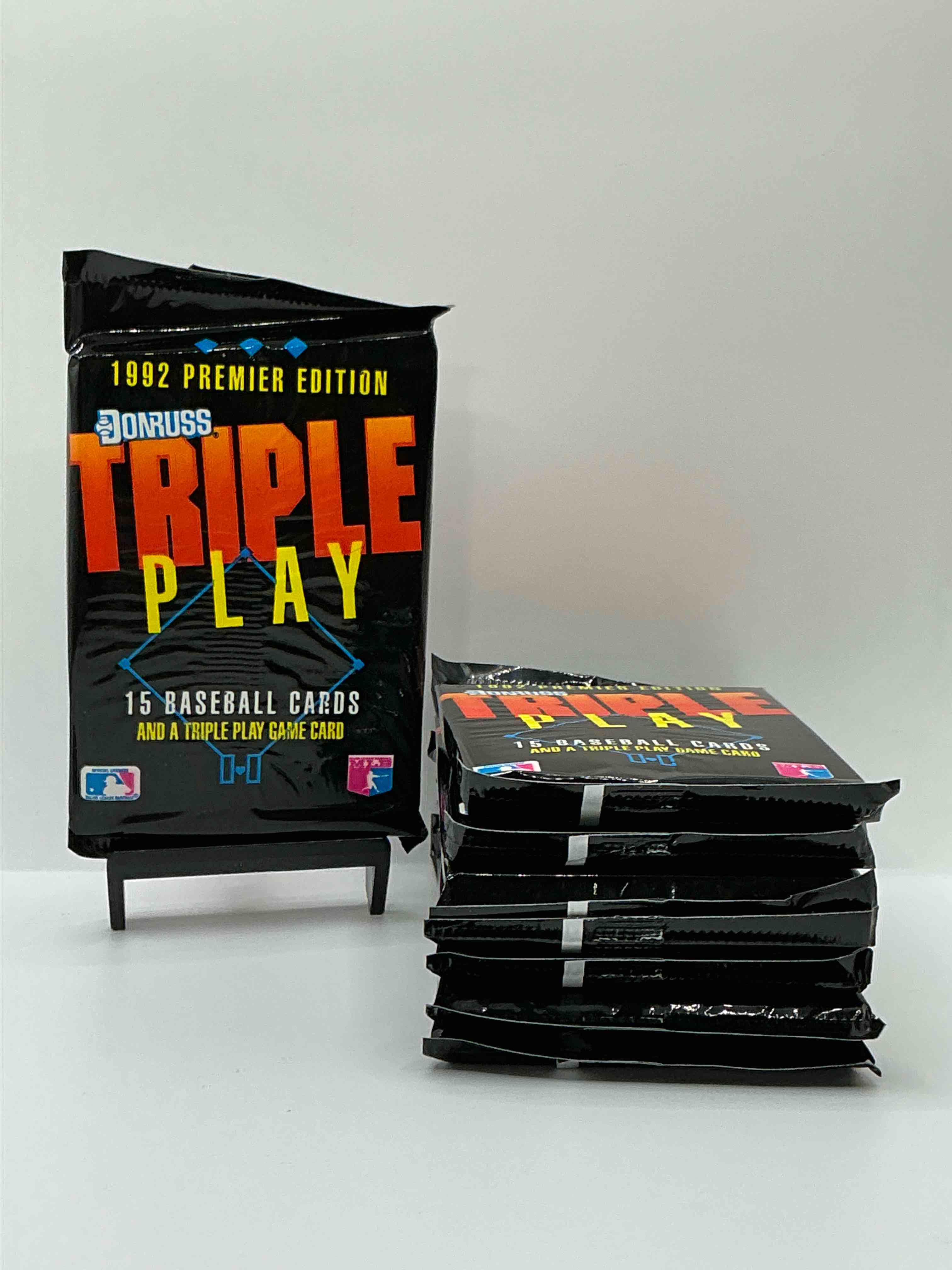 1992 donruss triple play mlb baseball card packs! look for randomly inserted gallery of the stars cards, awesome action, little hotshots & rub off game cards!along with griffey jr, mcgwire, ryan & more! rare packs!