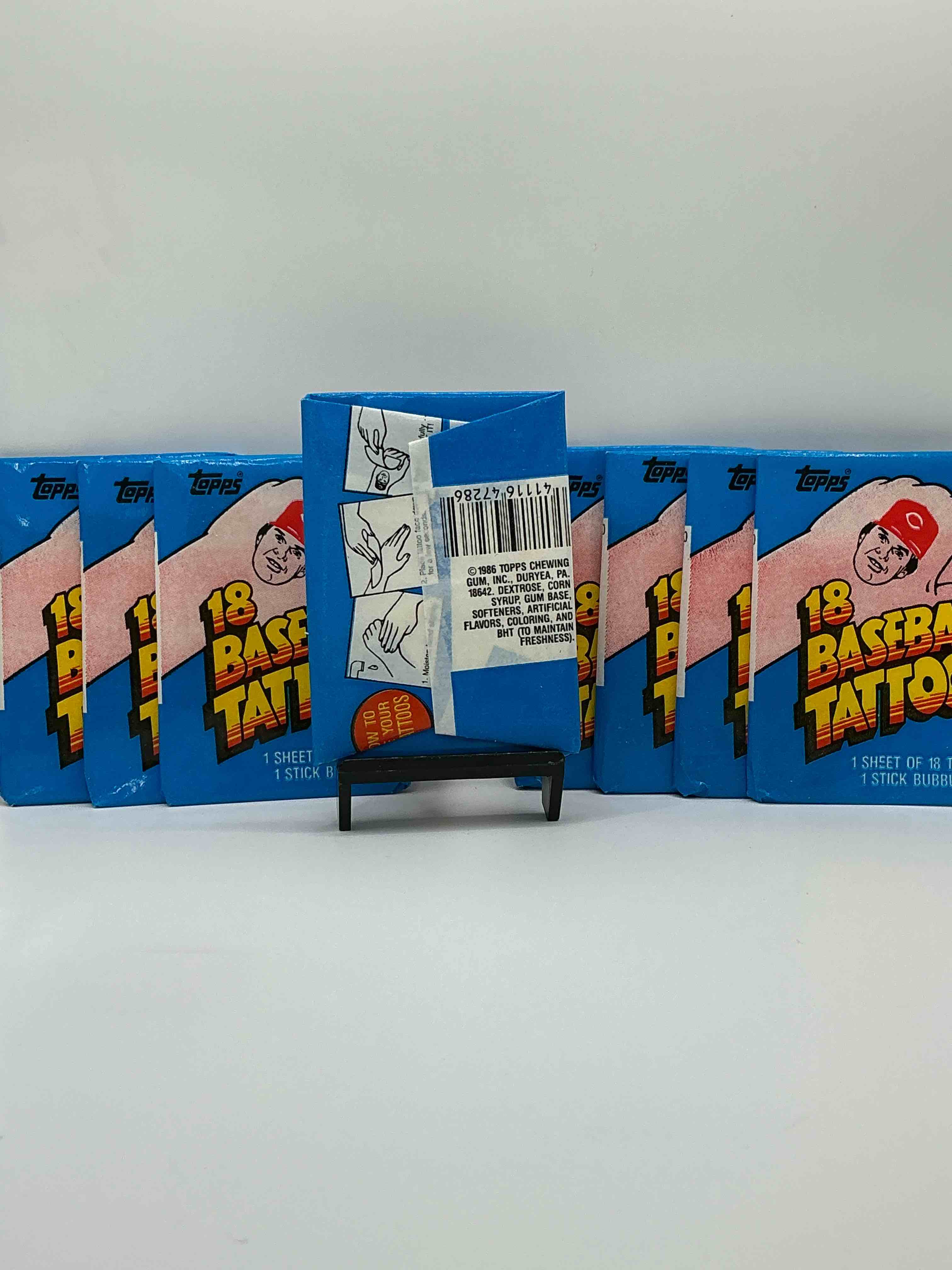 Condition photo showing New/Like New for rare! topps 1986 baseball tattoos! these packs are rare & fun, filled with cool mid 80’s tattoos of some of baseball greatest players & legends! super rare 80’s baseball fun!