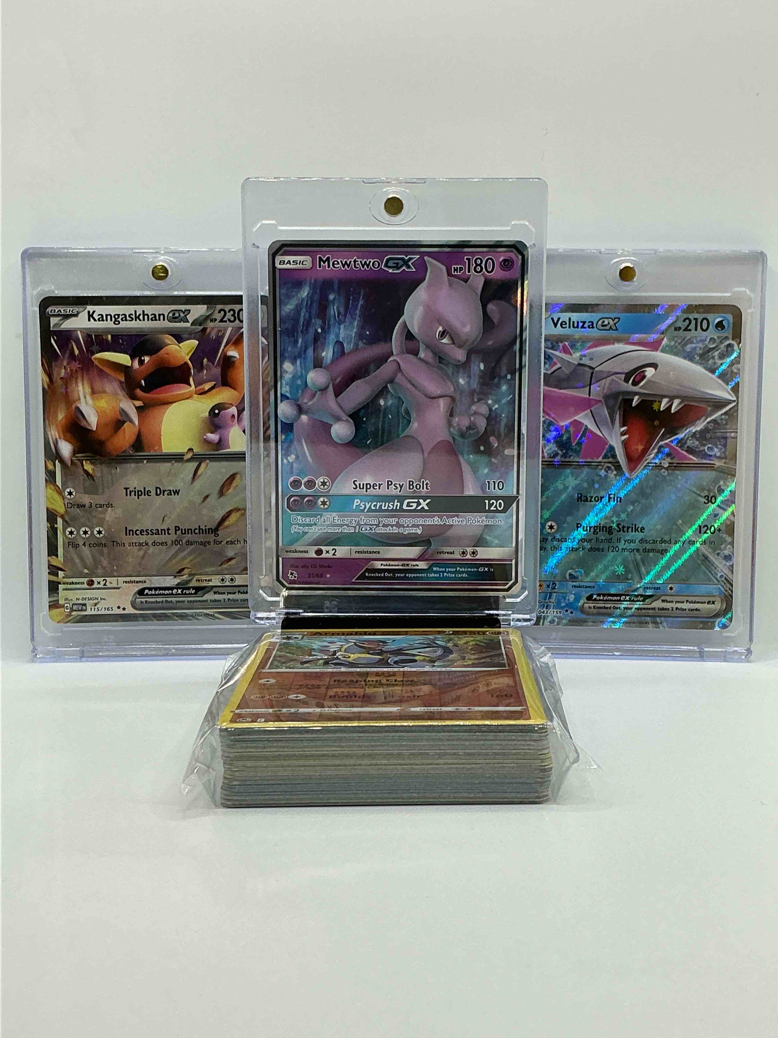 Mewtwo GX, Veluza EX, Kangastan EX & More! Insane Trio! Along With 50 Other Pokémon Heroes, Holos, Legends & Commons- Including Holographic Cards, Stage 2 Cards, Holos In All Forms & More! Also Includes 36 Non Holo Common/ Uncommon Basic & First Stage Cards Trainers & Energy Too! Perfect Set For Collectors & Enthusiasts!