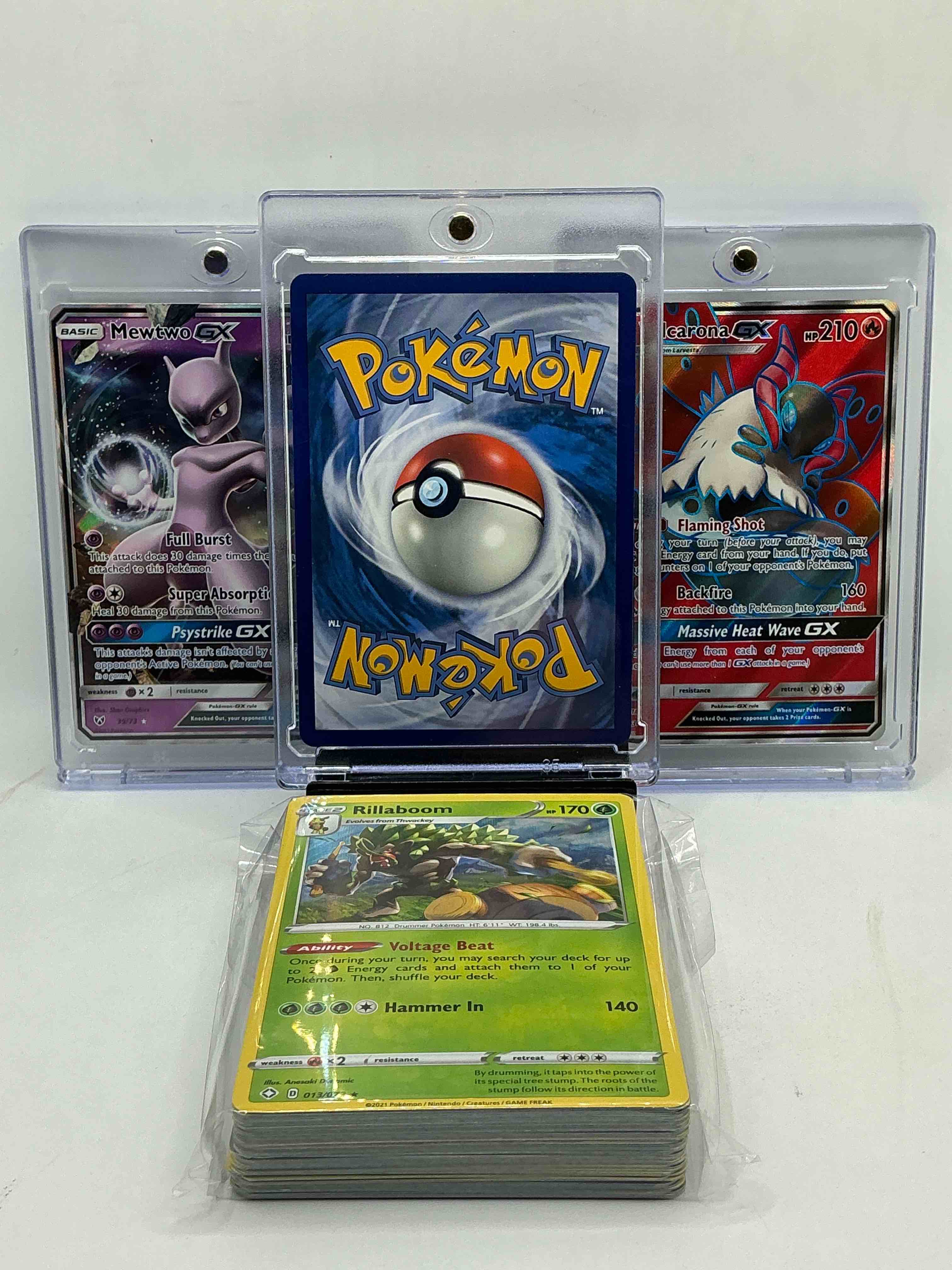 Condition photo showing New/Like New for charizard gx! volcarona gx! mewtwo gx! along with 50 other pokémon heroes, holos, legends & commons- including holographic cards, stage 2 cards, holos in all forms & more! also includes 36 non holo common/ uncommon basic & first stage cards trainers & energy too! perfect set for collectors & enthusiasts!