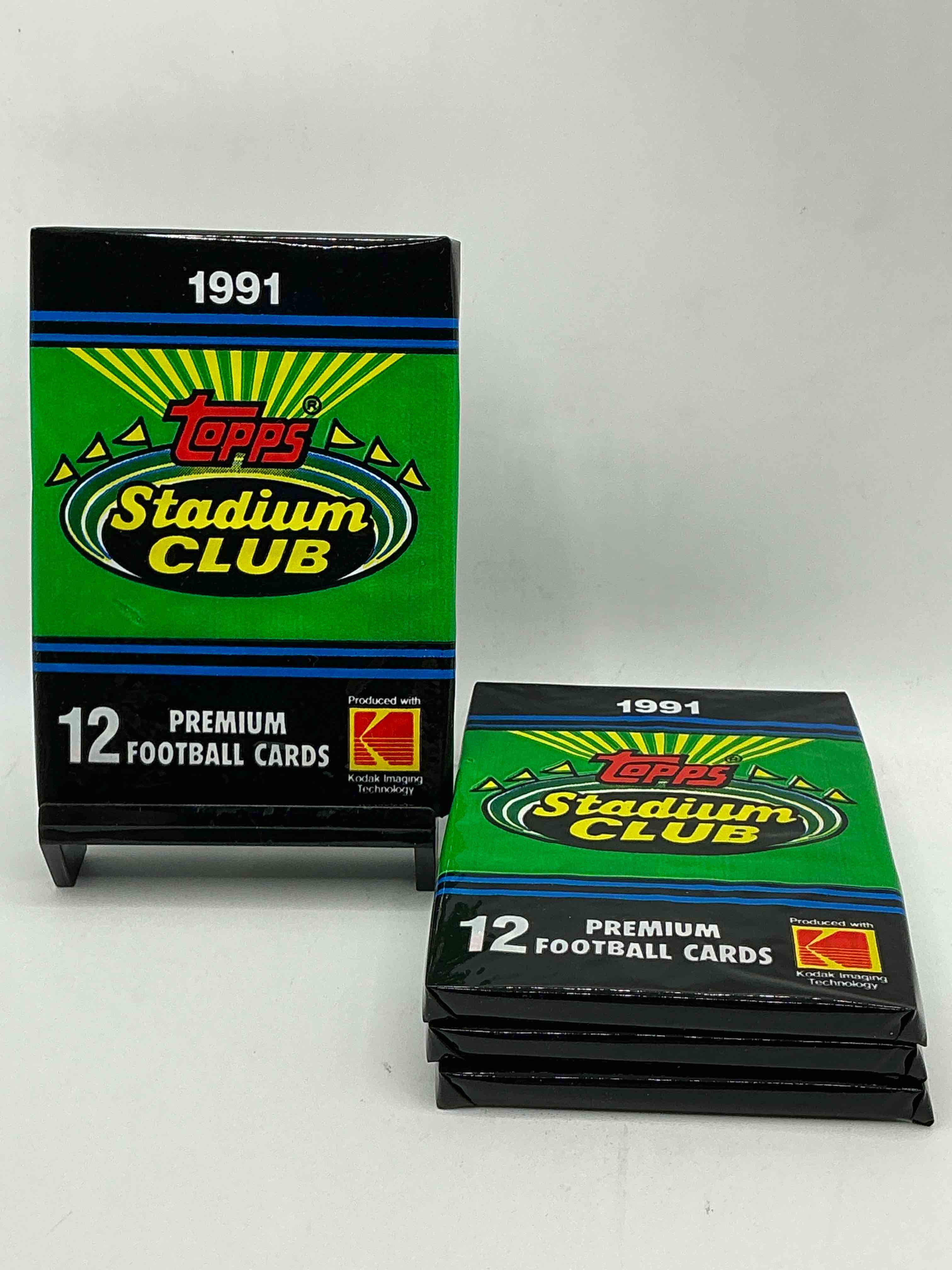1991 topps stadium club football unopened sports card pack, direct from original retail case. search for early barry sanders, emmitt smith, jerry rice & joe montana!