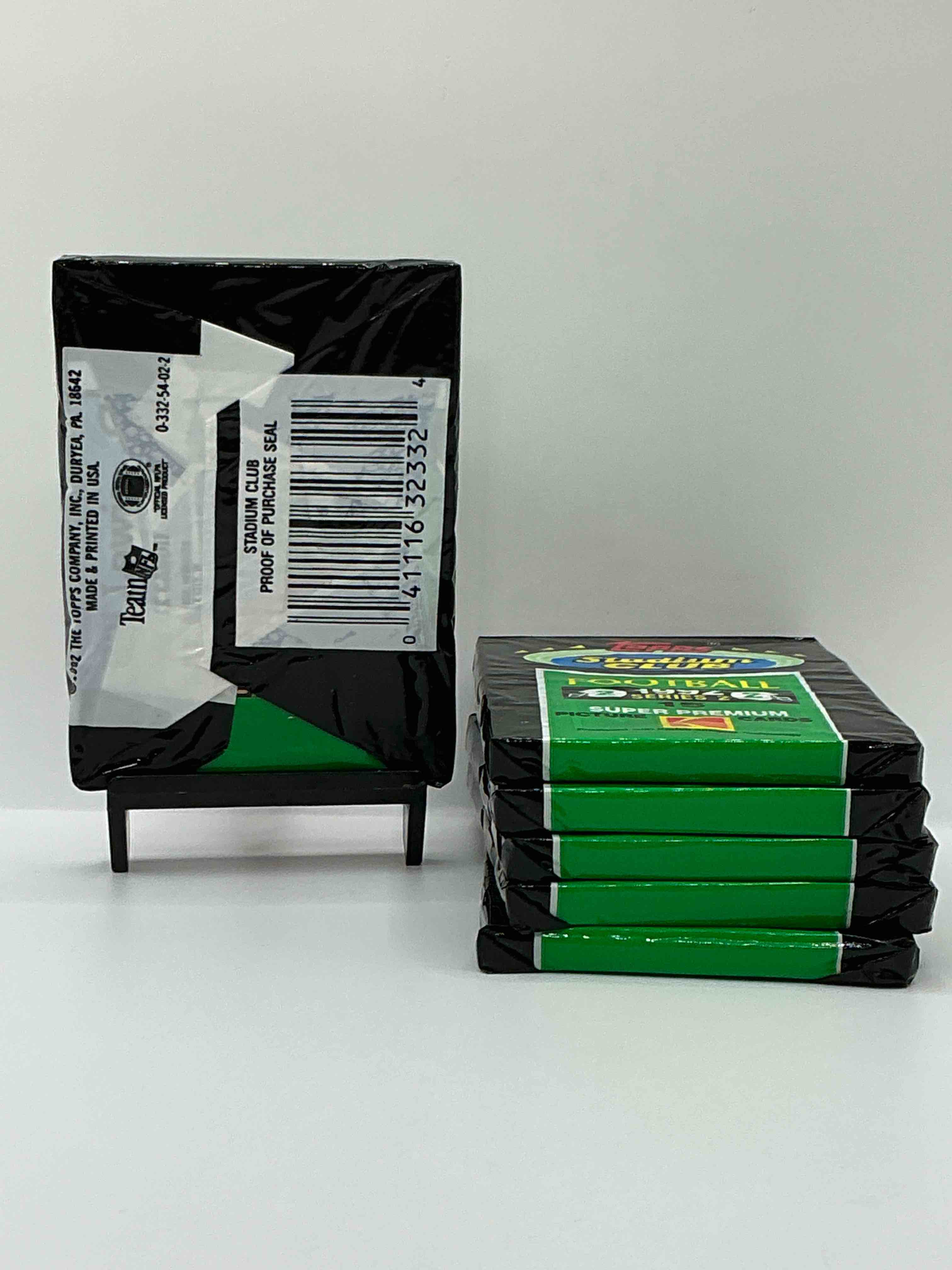 Condition photo showing New/Like New for rare! 1992 topps stadium club unopened wax pack, direct from original sealed retail case. sought after by collectors because each pack has a topps gold card! search for tons of stars like montana, rice, barry sanders, emmitt smith & so much more!