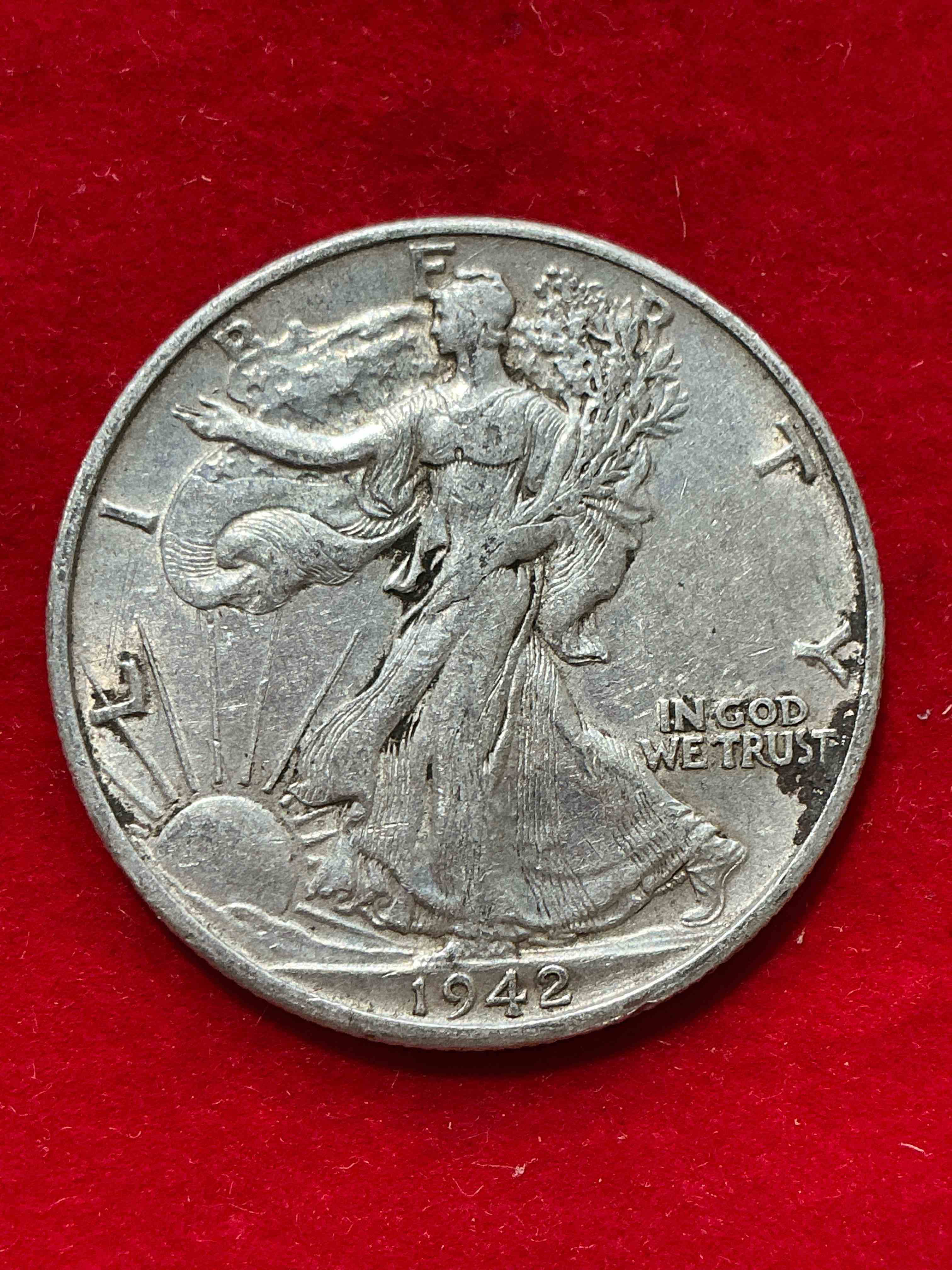 world war ii era silver! antique u.s. silver! liberty walking silver fine u.s. silver half dollar! this striking half dollars were minted from 1916-1947 & have become some of the most collectible coins in history! here is a striking appears uncirculated example from 1942! liberty walking coins are 90% fine u.s. silver, a great investment in precious metal!
