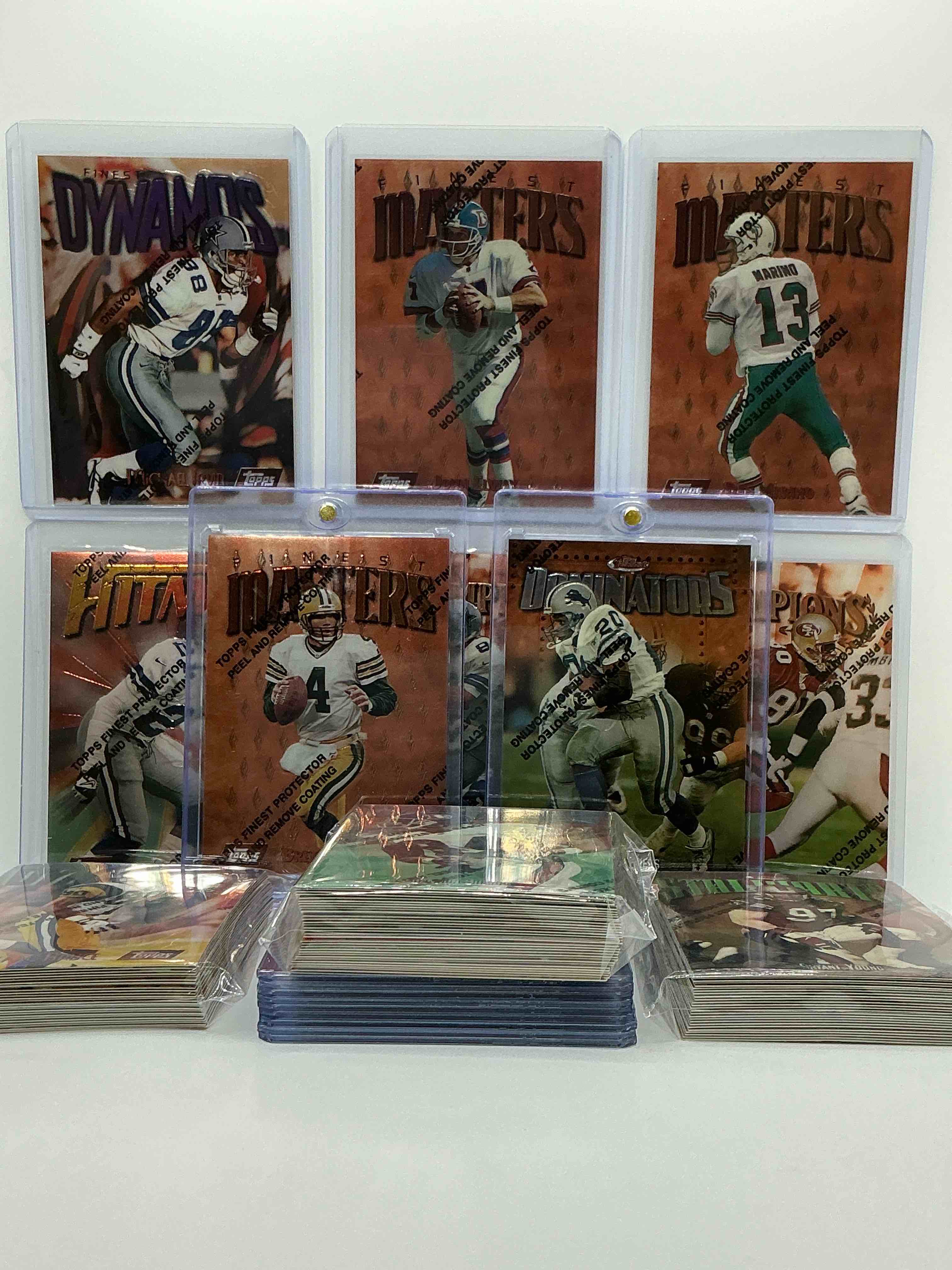 Condition photo showing New/Like New for brett favre, barry sanders, dan marino, michael irvin, troy aikman & more! insane! trio! this 100 card lot includes some of football biggest names, legends, heroes & more!