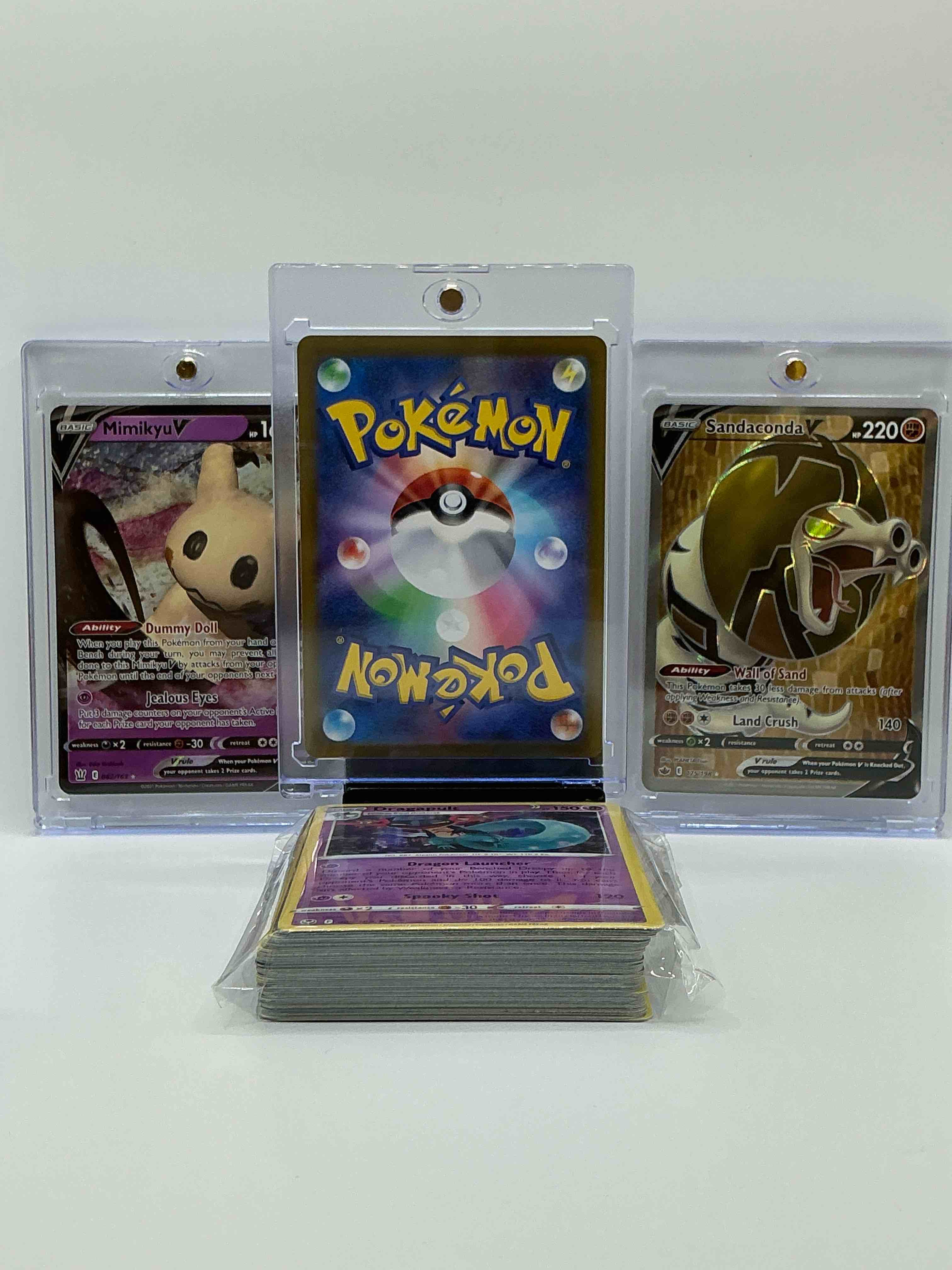 Condition photo showing New/Like New for charizard vstar, mimikyu v & sandaconda v! insane! along with 50 other pokémon heroes, holos, legends & commons- including holographic cards, stage 2 cards, holos in all forms & more! also includes 36 non holo common/ uncommon basic & first stage cards trainers & energy too! perfect set for collectors & enthusiasts!