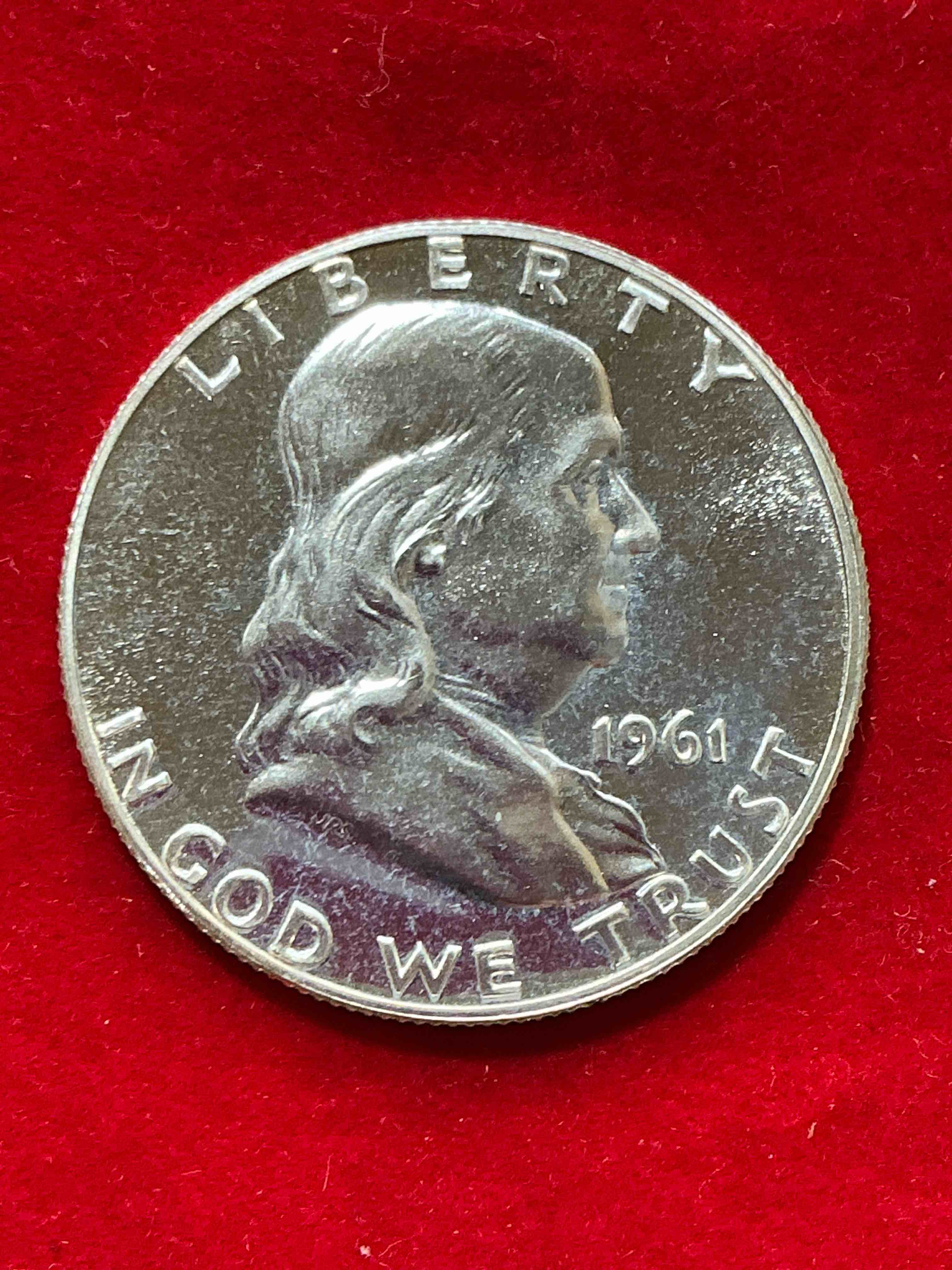 ben franklin silver! pre 1965 silver u.s. half dollar coin! before 1965 american half dollars were actually silver, here is a rare 1961 version in good condition! great for investing in precious metals! these heavy half dollars were minted at 90% silver and 10% copper, giving them a net weight of .36169 ounces of pure silver per coin! very rare in this great condition!