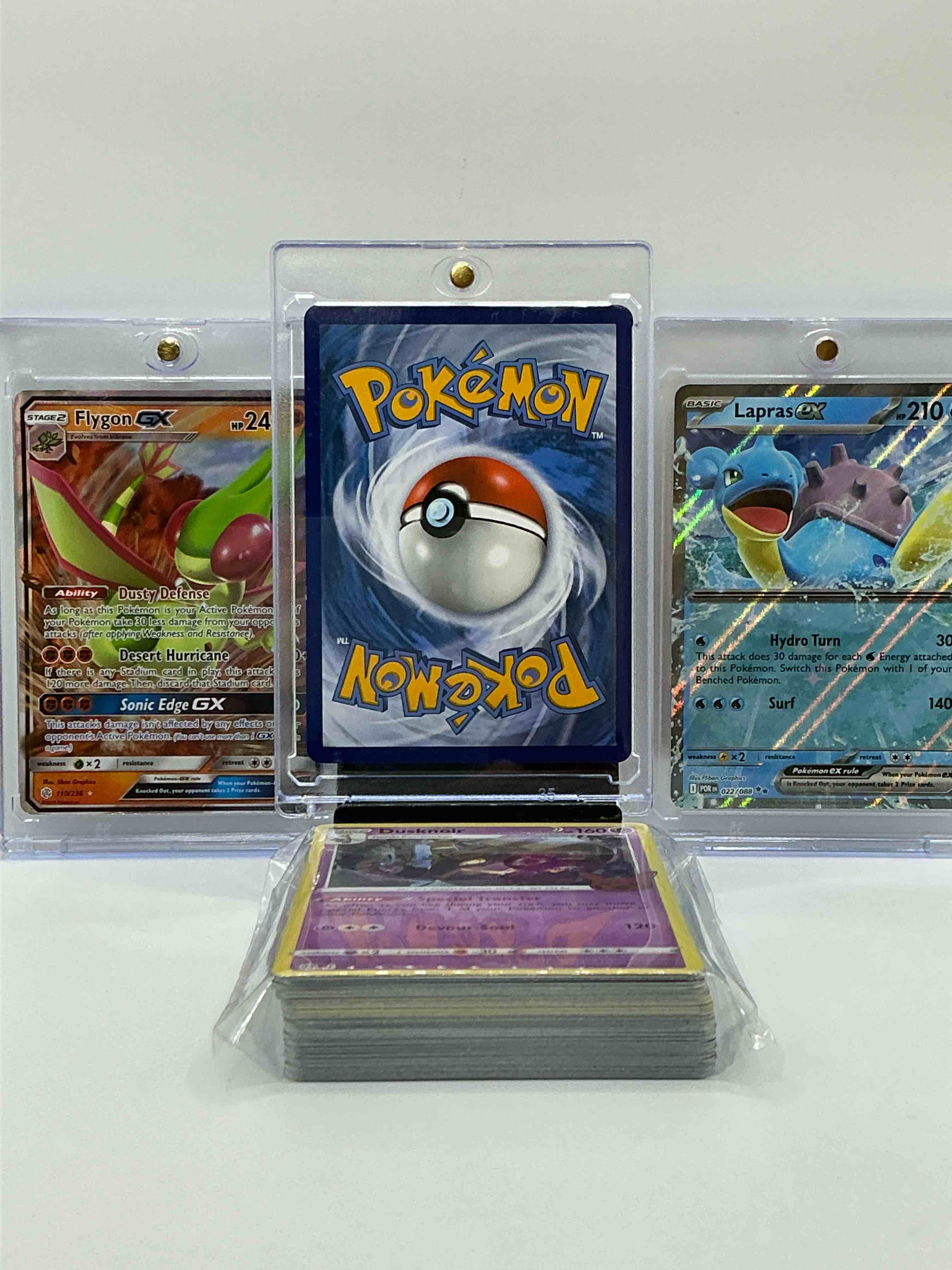 Condition photo showing New/Like New for charizard gx, lapras ex & more! insane! along with 50 other pokémon heroes, holos, legends & commons- including holographic cards, stage 2 cards, holos in all forms & more! also includes 36 non holo common/ uncommon basic & first stage cards trainers & energy too! perfect set for collectors & enthusiasts!