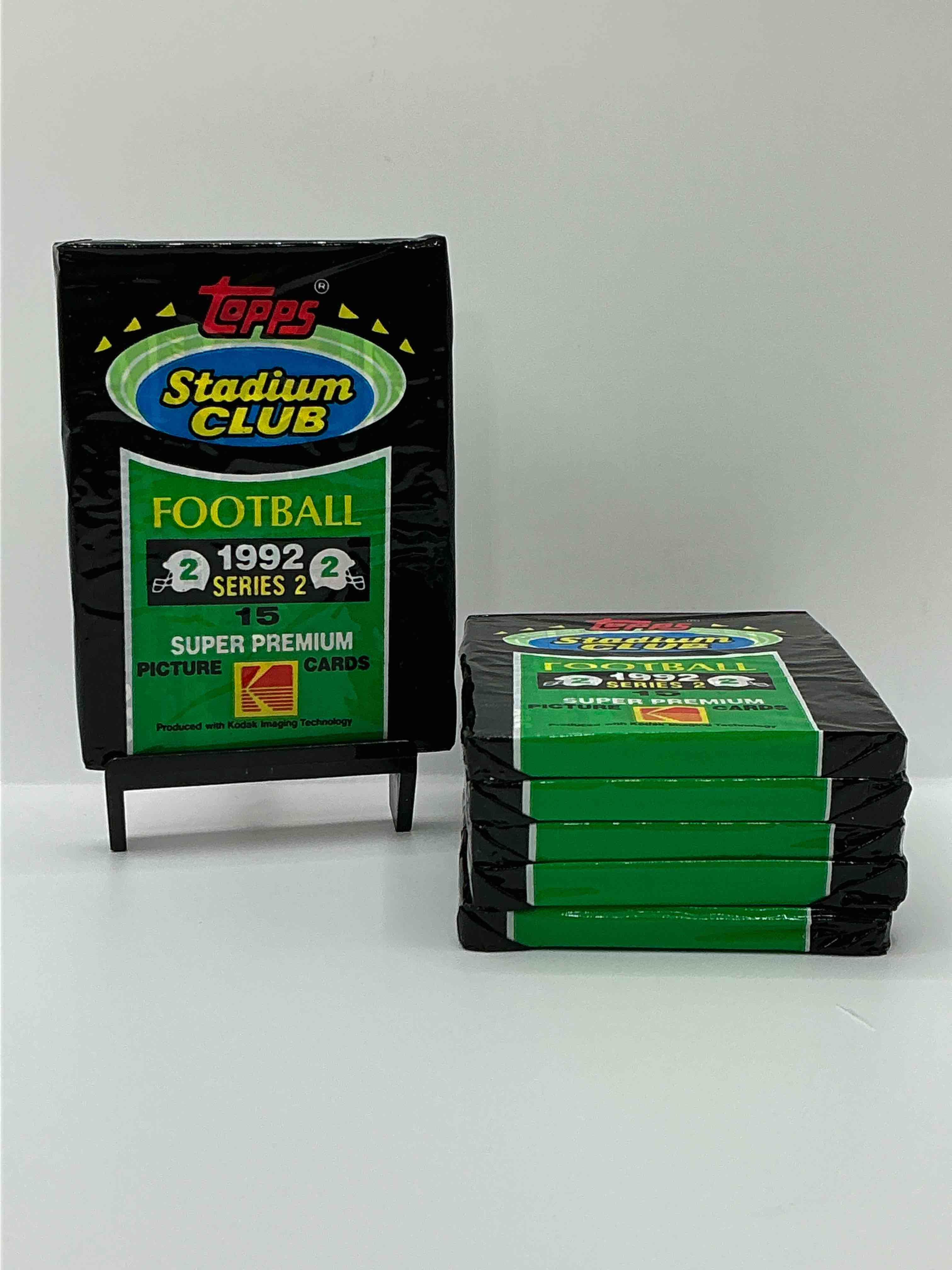 brett favre insanity! 1992 topps stadium club unopened packs! these high end packs could have some awesome cards! topps super premium picture cards... with possible brett favre, mint 10 worth over $250! all direct from original box!