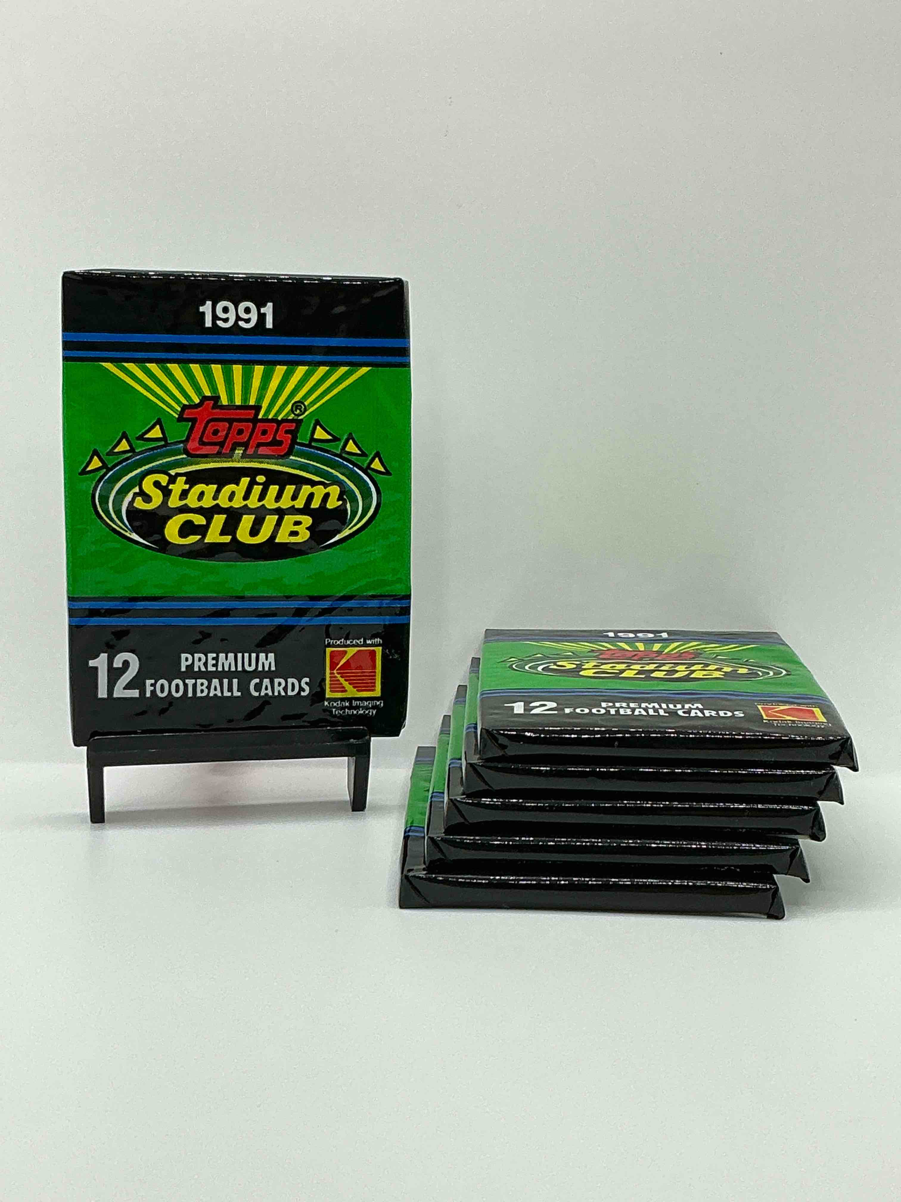 1991 topps stadium club football unopened sports card pack, direct from original retail case. search for early barry sanders, emmitt smith, jerry rice & joe montana!