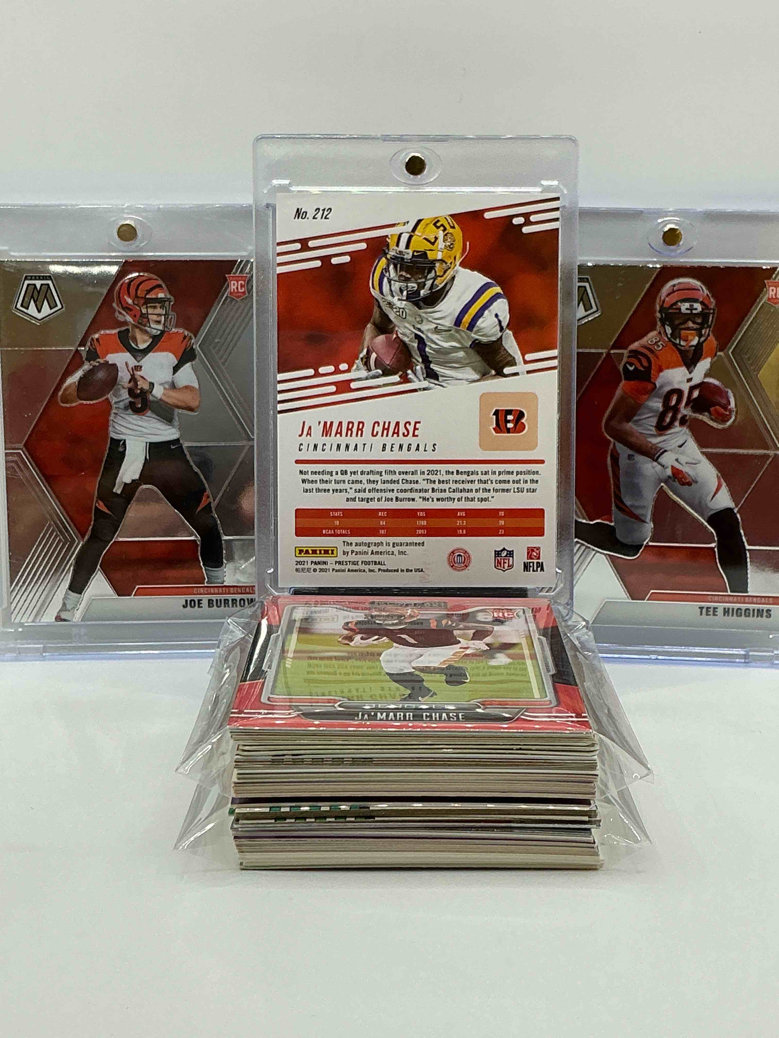 Condition photo showing New/Like New for bengals brothers! joe burrow, ja’marr chase & tee higgins! mosaic rookies & numbered ja’marr chase rookie! this 50 card lot includes commons, legends, heroes & more! wow! insane! vintage & new!