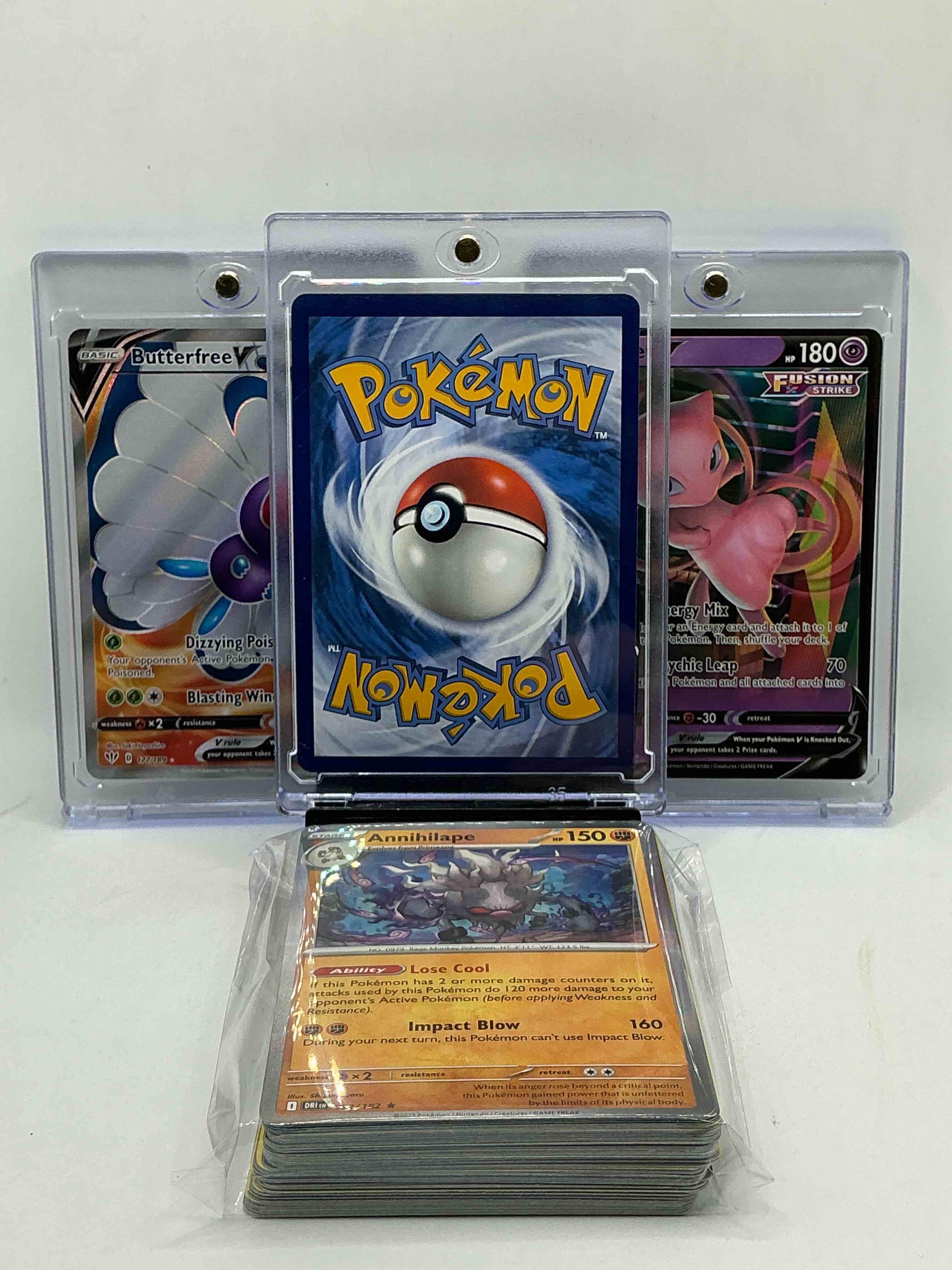 Condition photo showing New/Like New for charizard v! butterfree v! mew v! along with 50 other pokémon heroes, holos, legends & commons- including holographic cards, stage 2 cards, holos in all forms & more! also includes 36 non holo common/ uncommon basic & first stage cards trainers & energy too! perfect set for collectors & enthusiasts!
