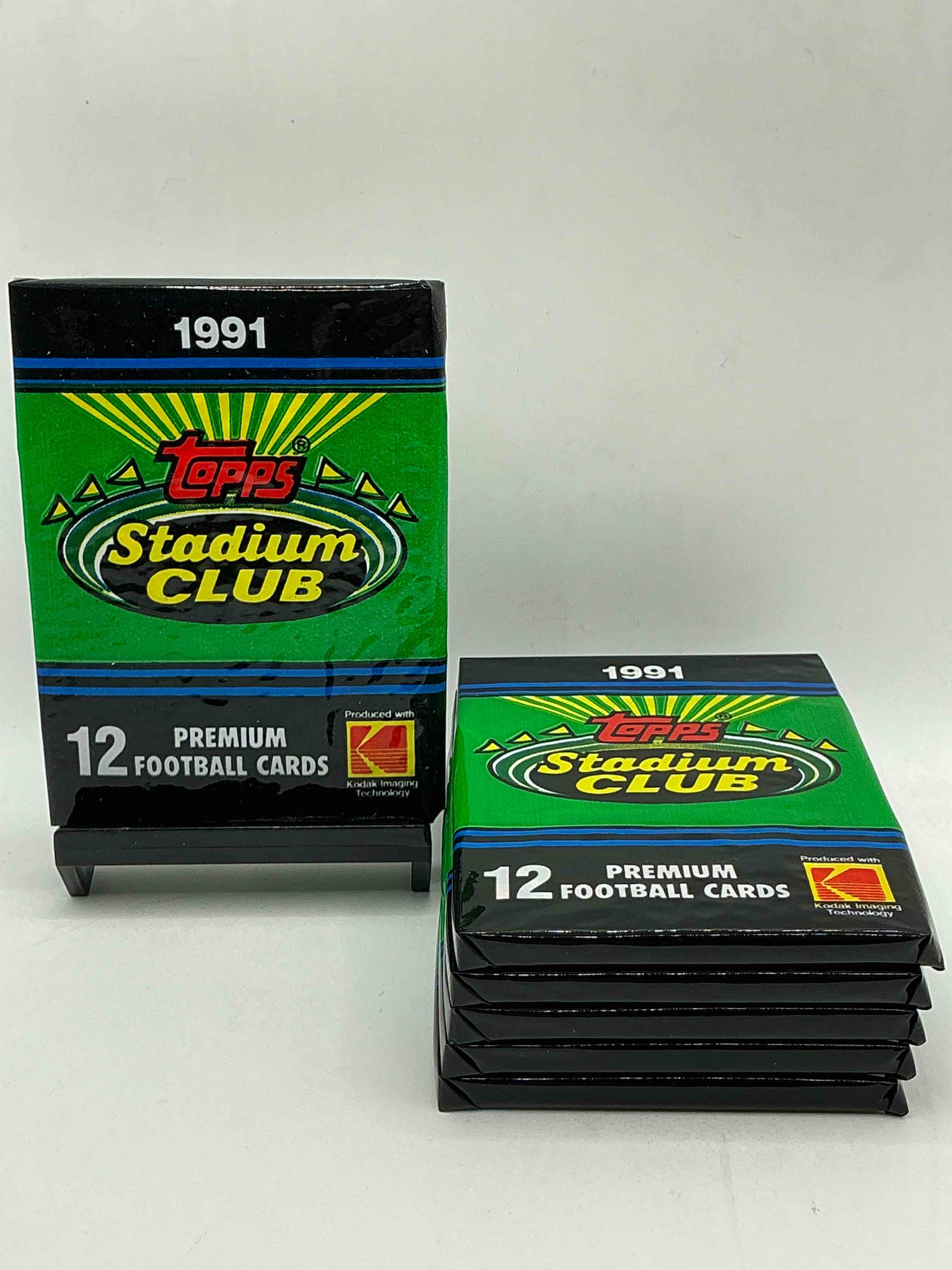 1991 topps stadium club football unopened sports card pack, direct from original retail case. search for early barry sanders, emmitt smith, jerry rice & joe montana!