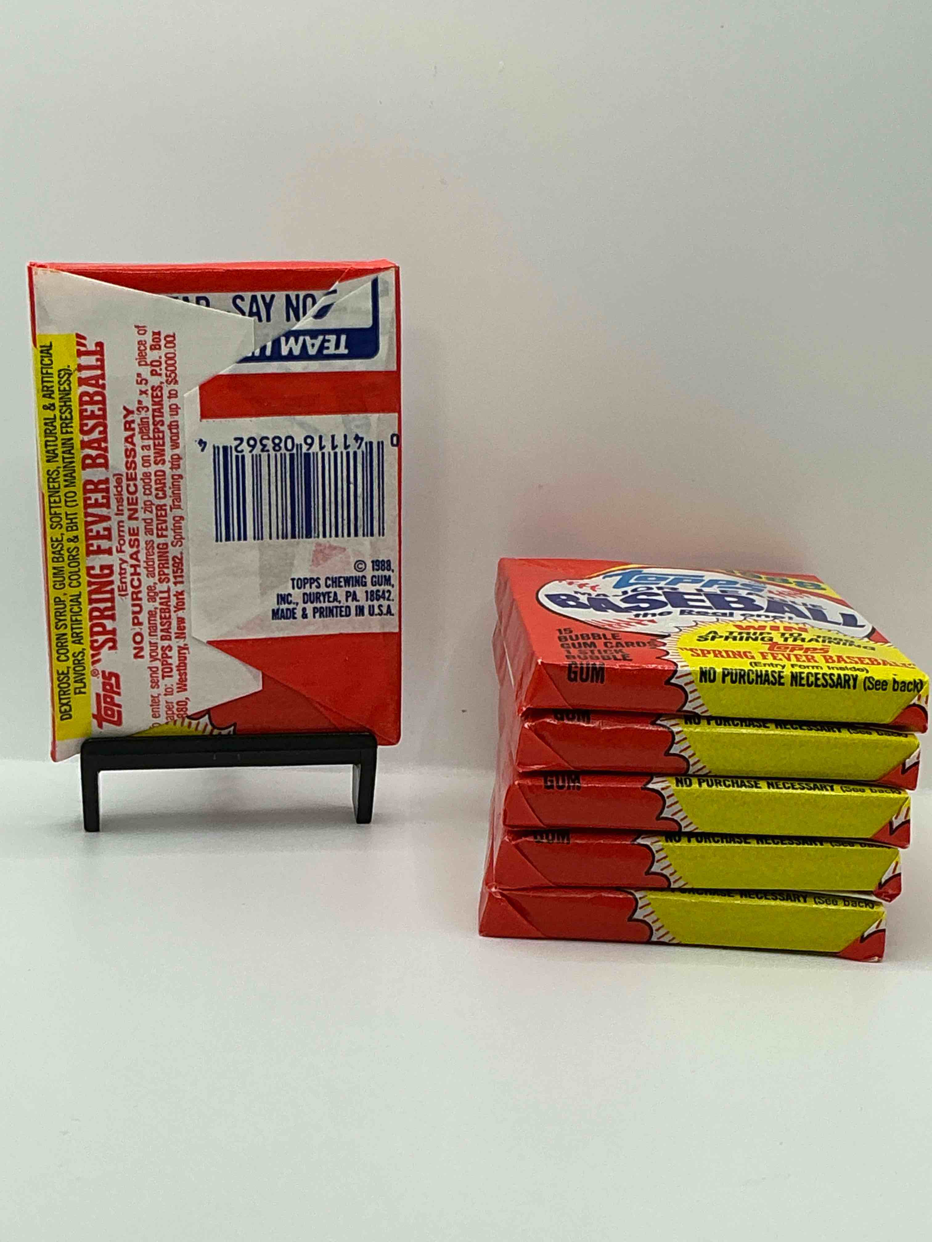 Condition photo showing New/Like New for 80's baseball fan's rejoice! 1988 topps baseball unopened wax packs full of collectible trading cards! search for valuable don mattingly "world of baseball" & nolan ryan cards worth hundreds in perfect condition!