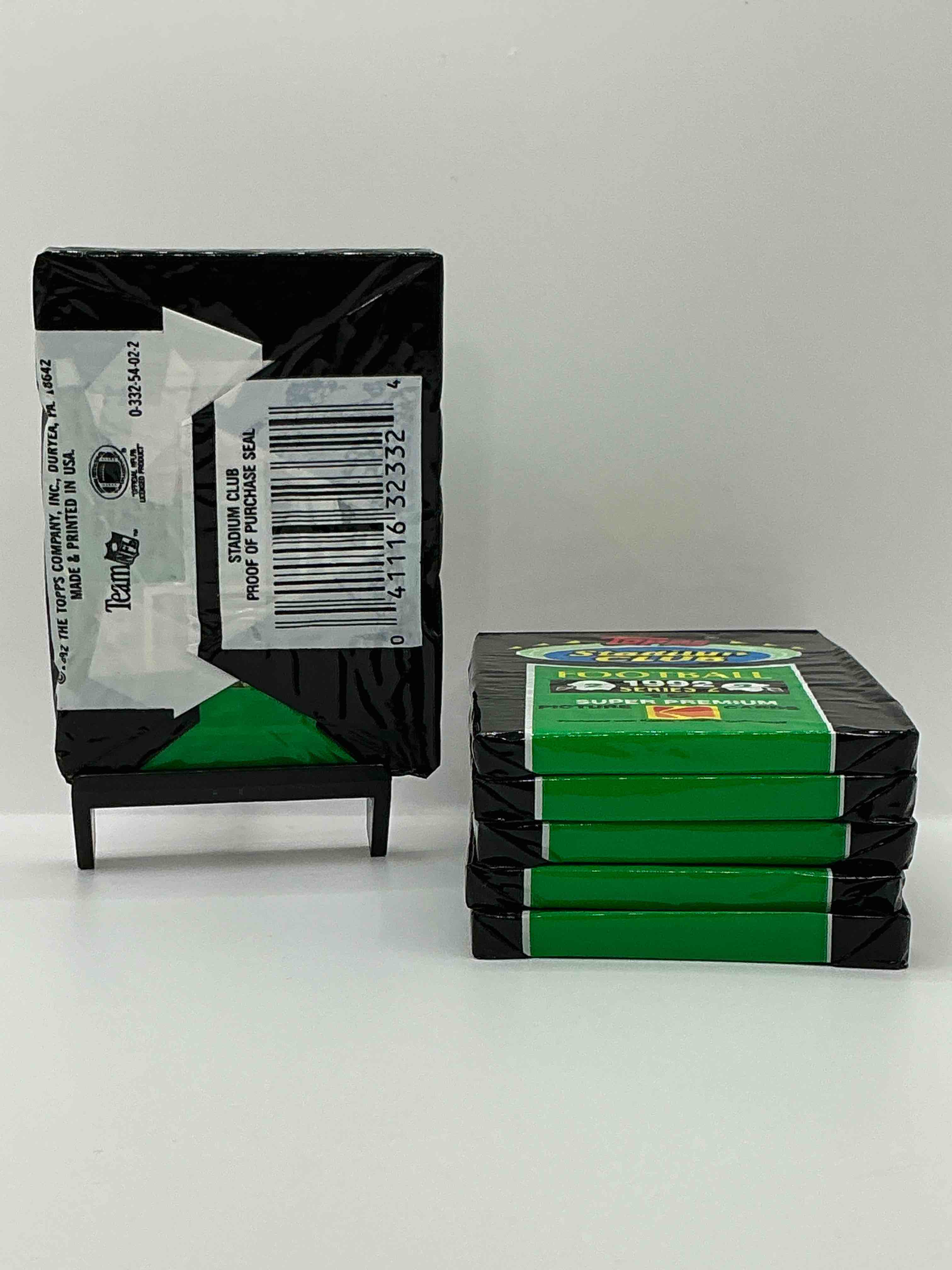 Condition photo showing New/Like New for 1991 topps stadium club football unopened sports card pack, direct from original retail case. search for early barry sanders, emmitt smith, jerry rice & joe montana!