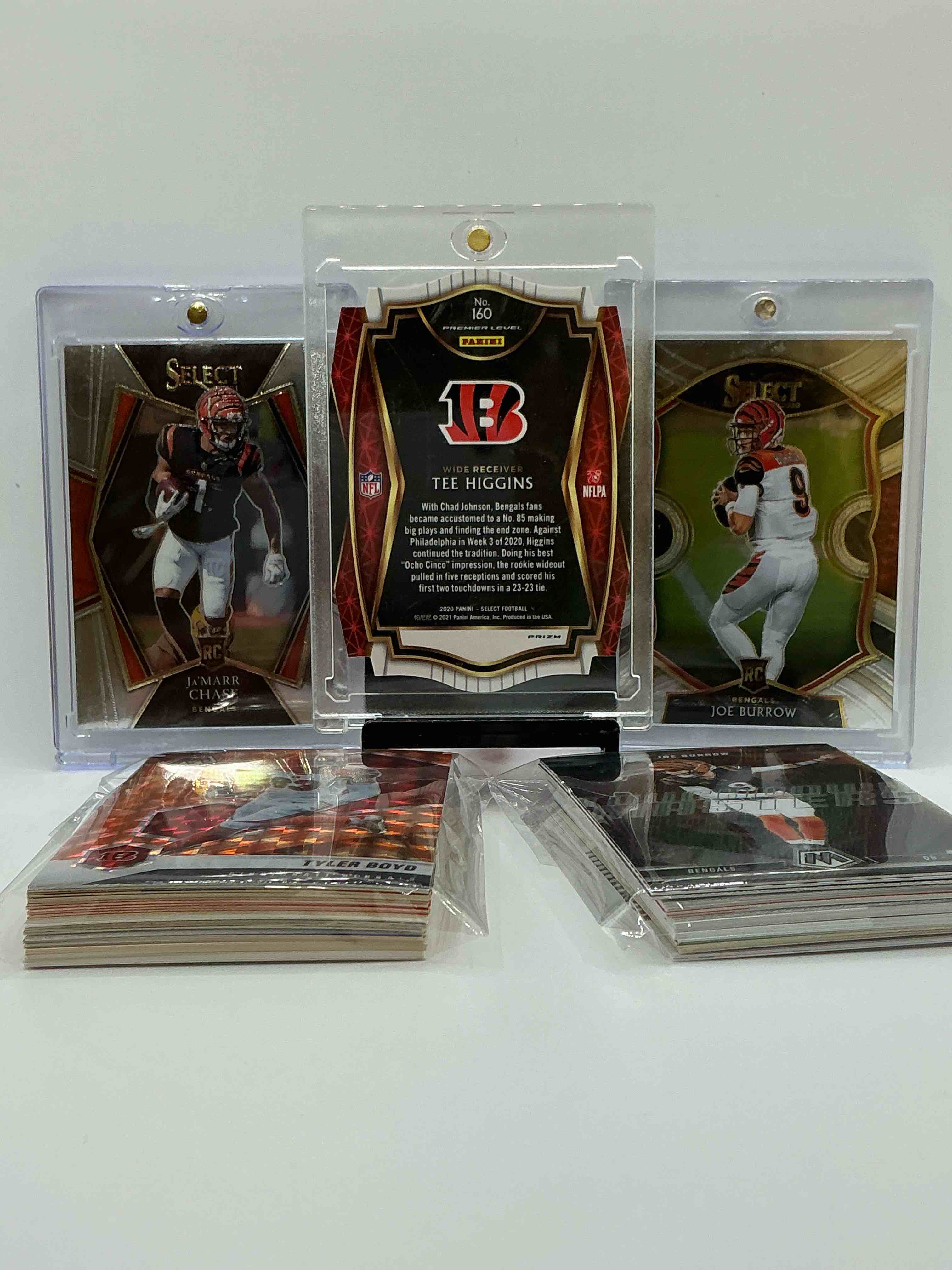 Condition photo showing New/Like New for bengals brothers! select rookie trio! insane! green diecut select tee higgins rookie, joe burrow rookie & ja’marr chase rookie! this 50 card lot includes heroes, rookies, legends & more! vintage & new!