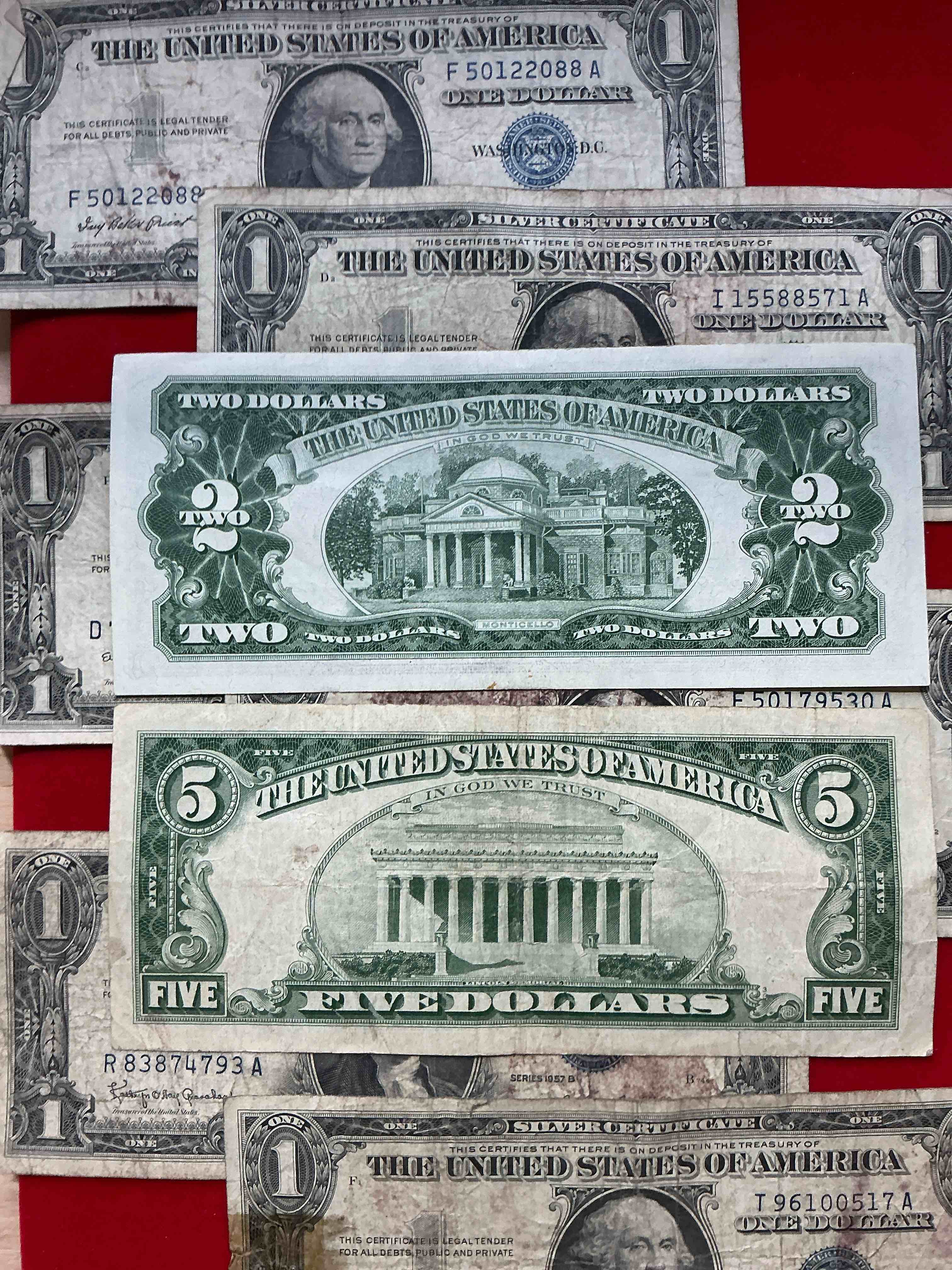 Condition photo showing Good Condition for rare american dollar bills! red seal five dollar bill & red seal two dollar bill, along with silver certificates! five dollar bill ultra rare & in good condition, red seal two dollar bill in good condition & silver certificates produced from 1878 to 1964 & are still considered legal tender at face value. here are gorgeous, circulated 1935 & 1957 u.s. one dollar silver certificate, with highly collectible "blue seal!* own an awesome piece of history! american dollar lot! 