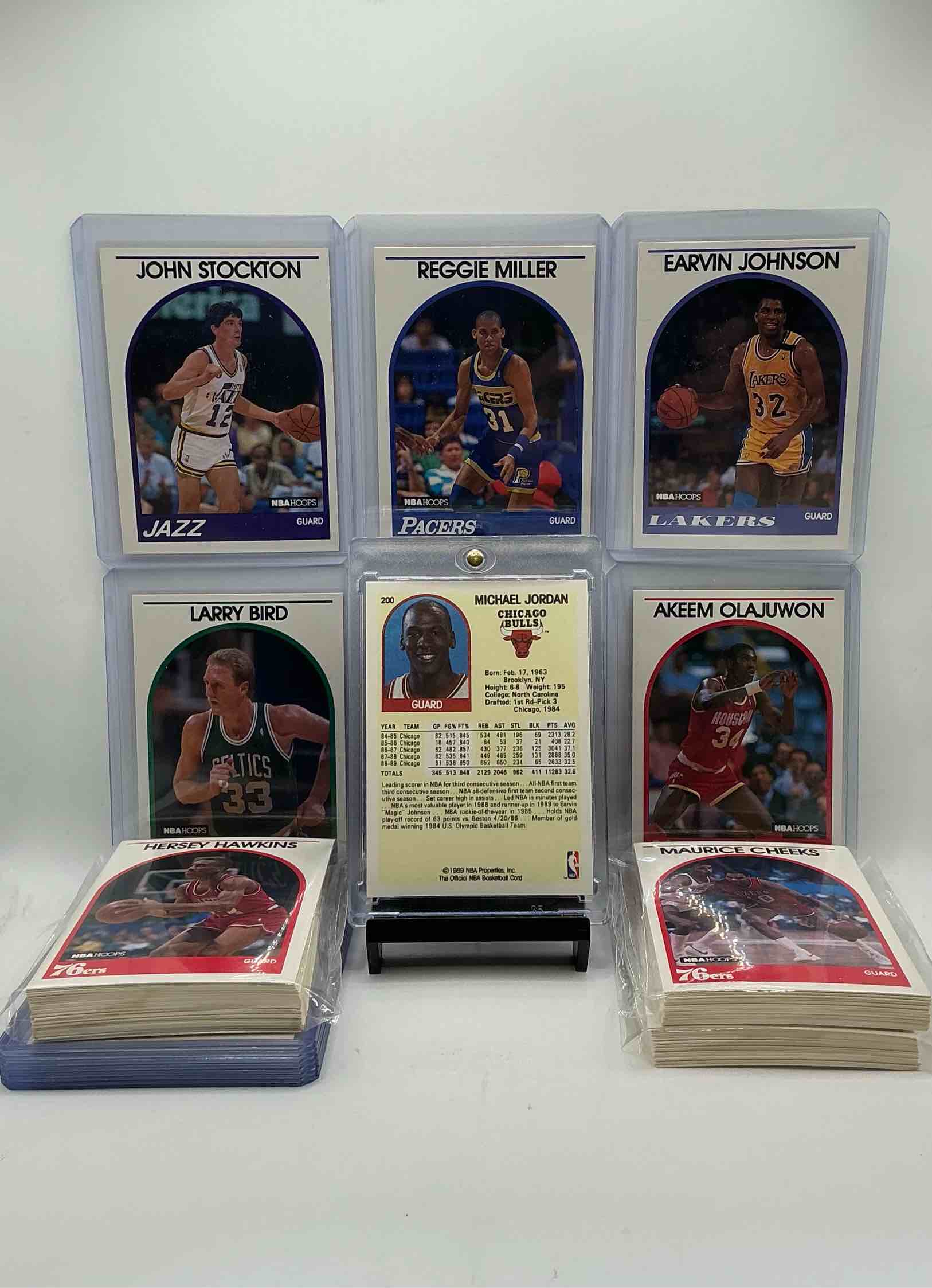 Condition photo showing New/Like New for michael jordan! 1989 hoops 100 card basketball! the best cards from the year! michael jordan, magic johnson, larry bird, scottie pippen, david robinson, charles barkley, karl malone, clyde drexler & more! all stars, hall of famers, champions & more, the perfect mix of miscellaneous '90 nba variety!