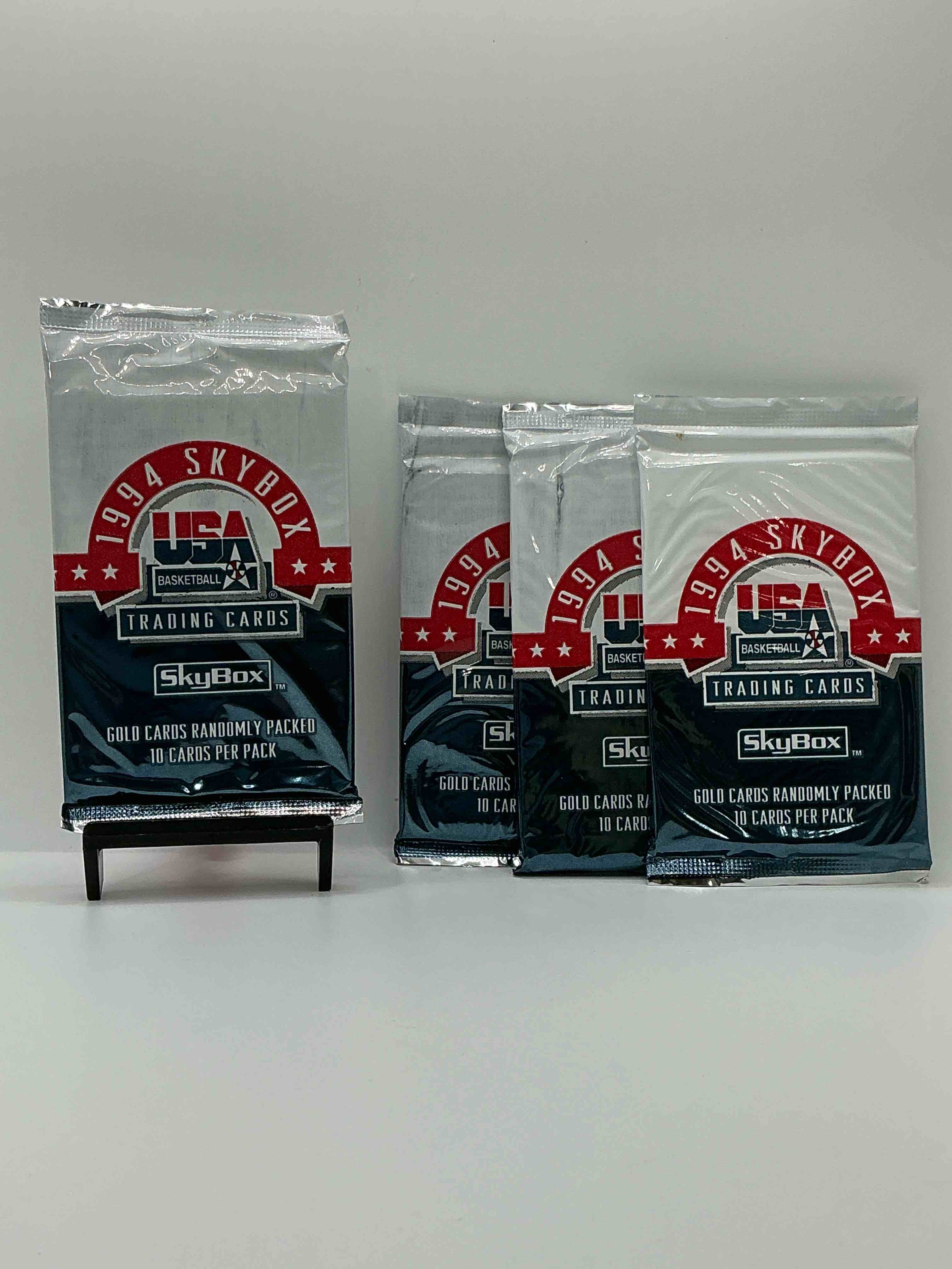 1994 usa basketball gold! here's a rare chance to get sealed usa nba basketball card packs, direct from original retail case! 1994 nba skybox sealed card packs, dream team fans here it is! shaq, isiah thomas, reggie miller & so much more! search for randomly inserted valuable gold cards. hard to find awesome sports card memorabilia, go usa!