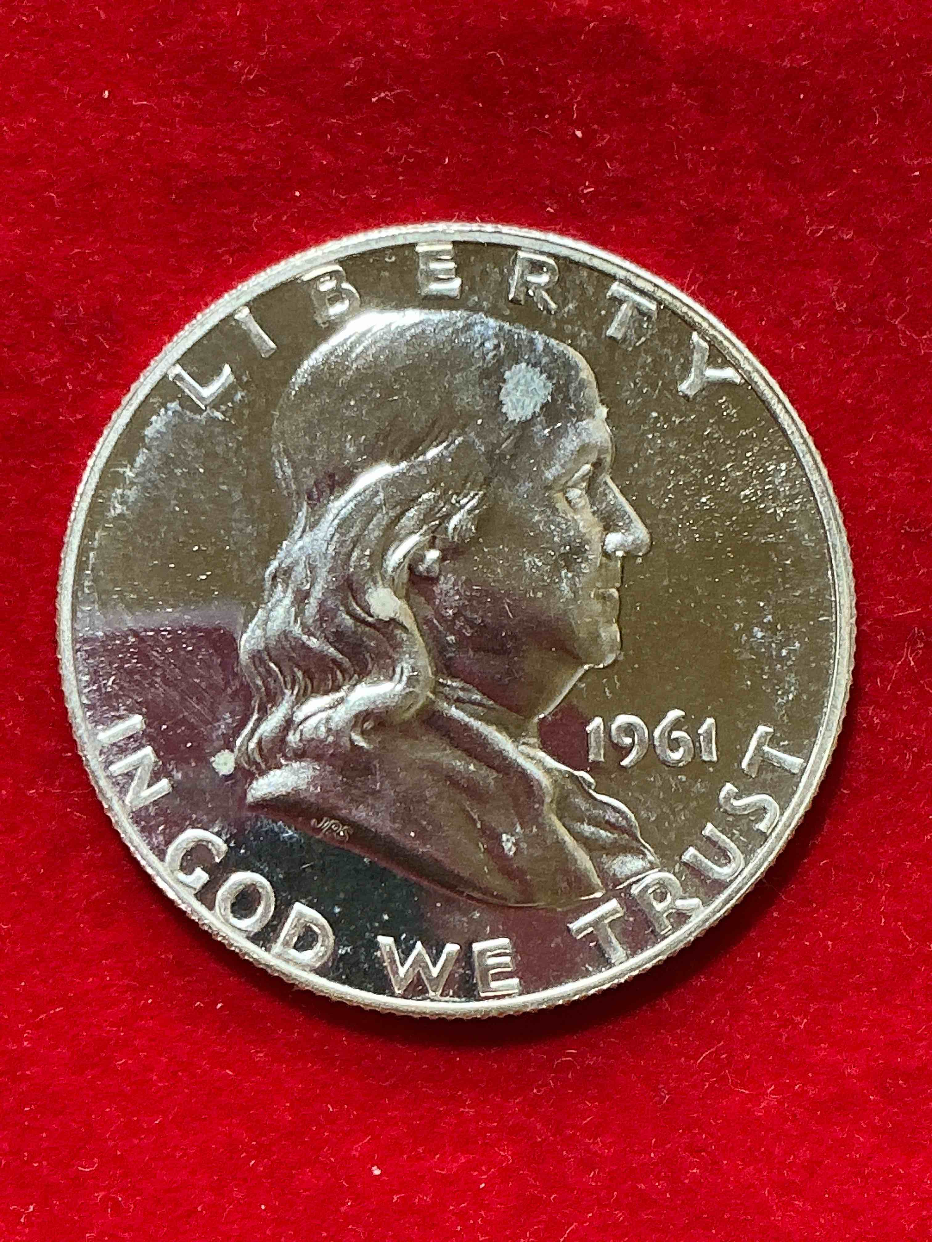 ben franklin silver! pre 1965 silver u.s. half dollar coin! before 1965 american half dollars were actually silver, here is a rare 1961 version in good condition! great for investing in precious metals! these heavy half dollars were minted at 90% silver and 10% copper, giving them a net weight of .36169 ounces of pure silver per coin! very rare in this great condition!