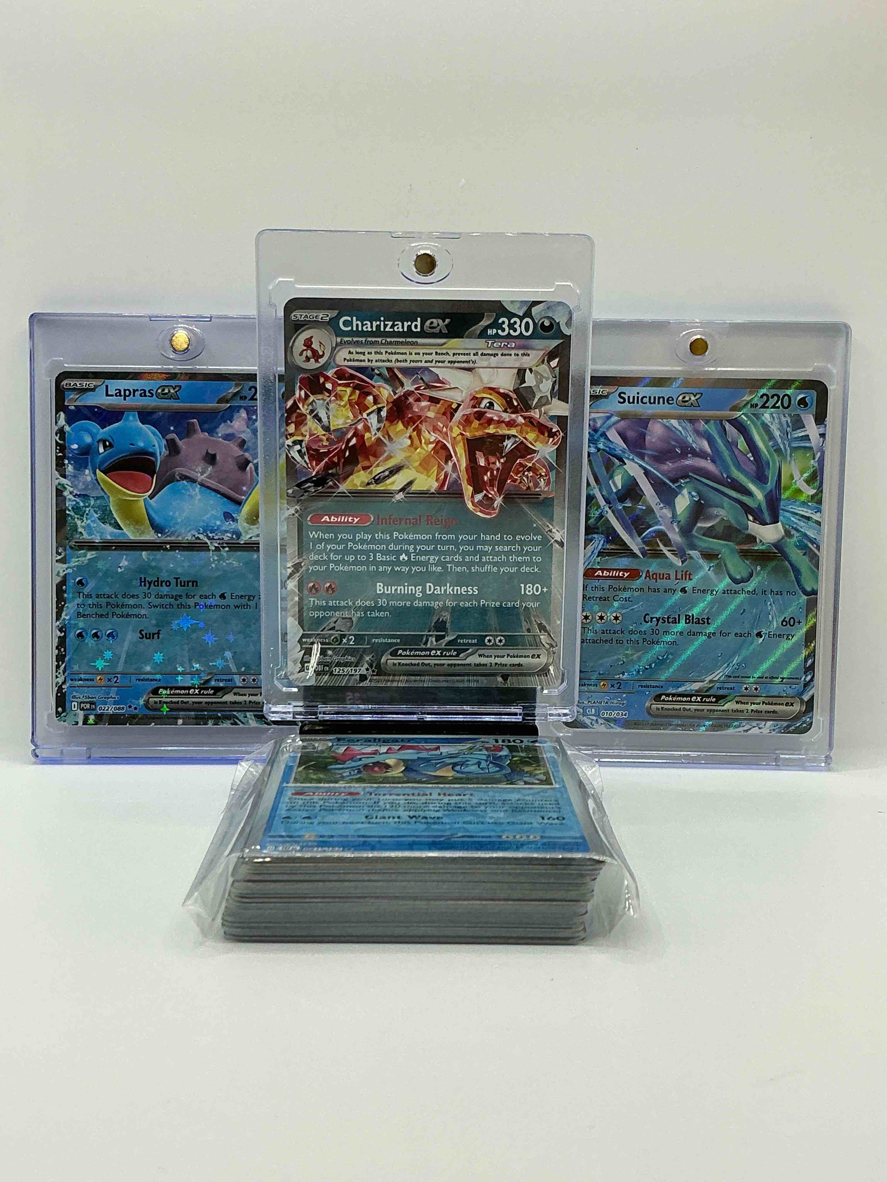 Condition photo showing New/Like New for charizard ex, lapras ex, suicune ex & more! along with 50 other pokémon heroes, holos, legends & commons- including holographic cards, stage 2 cards, holos in all forms & more! also includes 36 non holo common/ uncommon basic & first stage cards trainers & energy too! perfect set for collectors & enthusiasts!