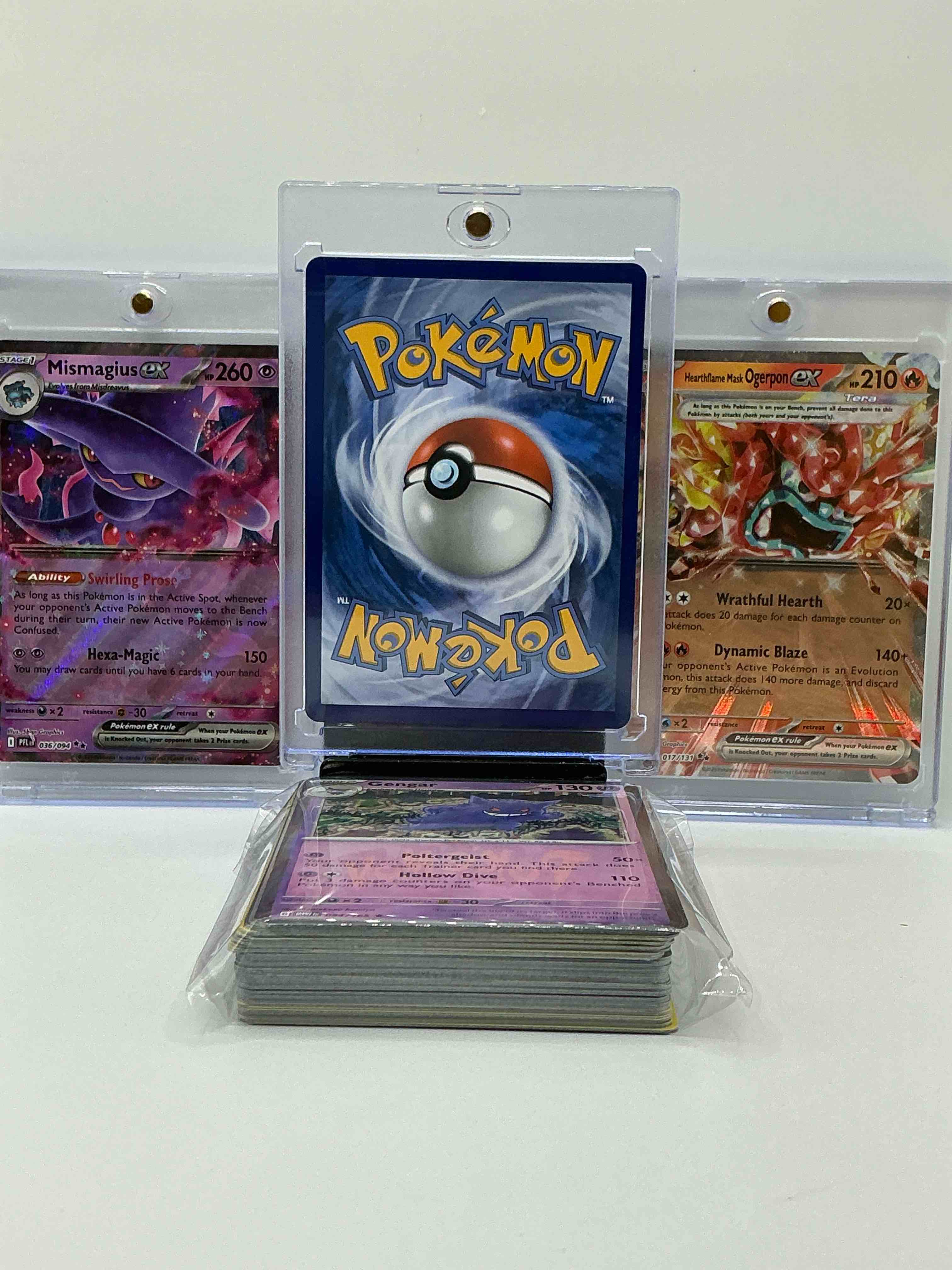 Condition photo showing New/Like New for charizard ex, mismagius ex & more! along with 50 other pokémon heroes, holos, legends & commons- including holographic cards, stage 2 cards, holos in all forms & more! also includes 36 non holo common/ uncommon basic & first stage cards trainers & energy too! perfect set for collectors & enthusiasts!