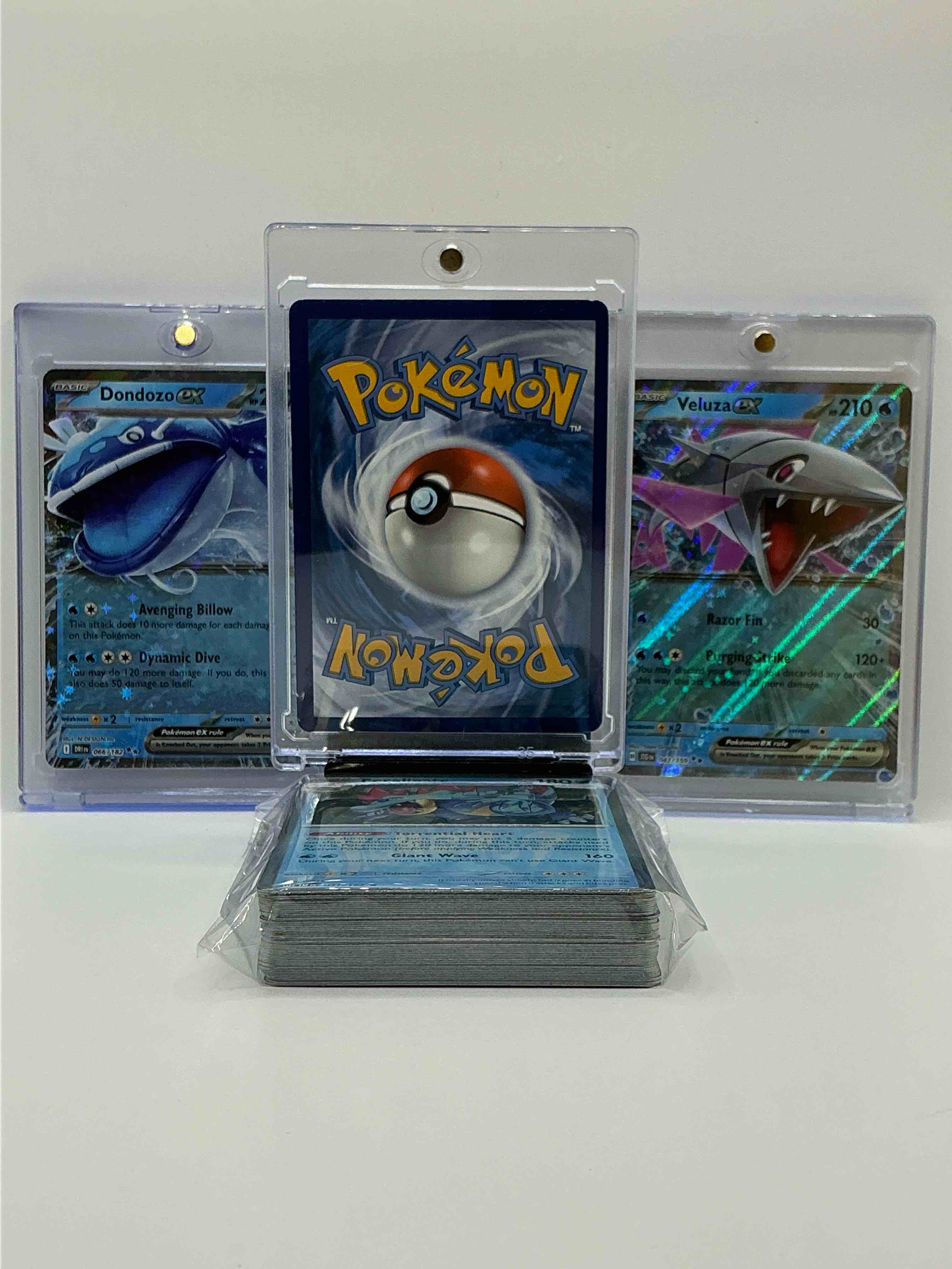 Condition photo showing New/Like New for charizard gx, dondozo ex & veluza ex & more! along with 50 other pokémon heroes, holos, legends & commons- including holographic cards, stage 2 cards, holos in all forms & more! also includes 36 non holo common/ uncommon basic & first stage cards trainers & energy too! perfect set for collectors & enthusiasts!