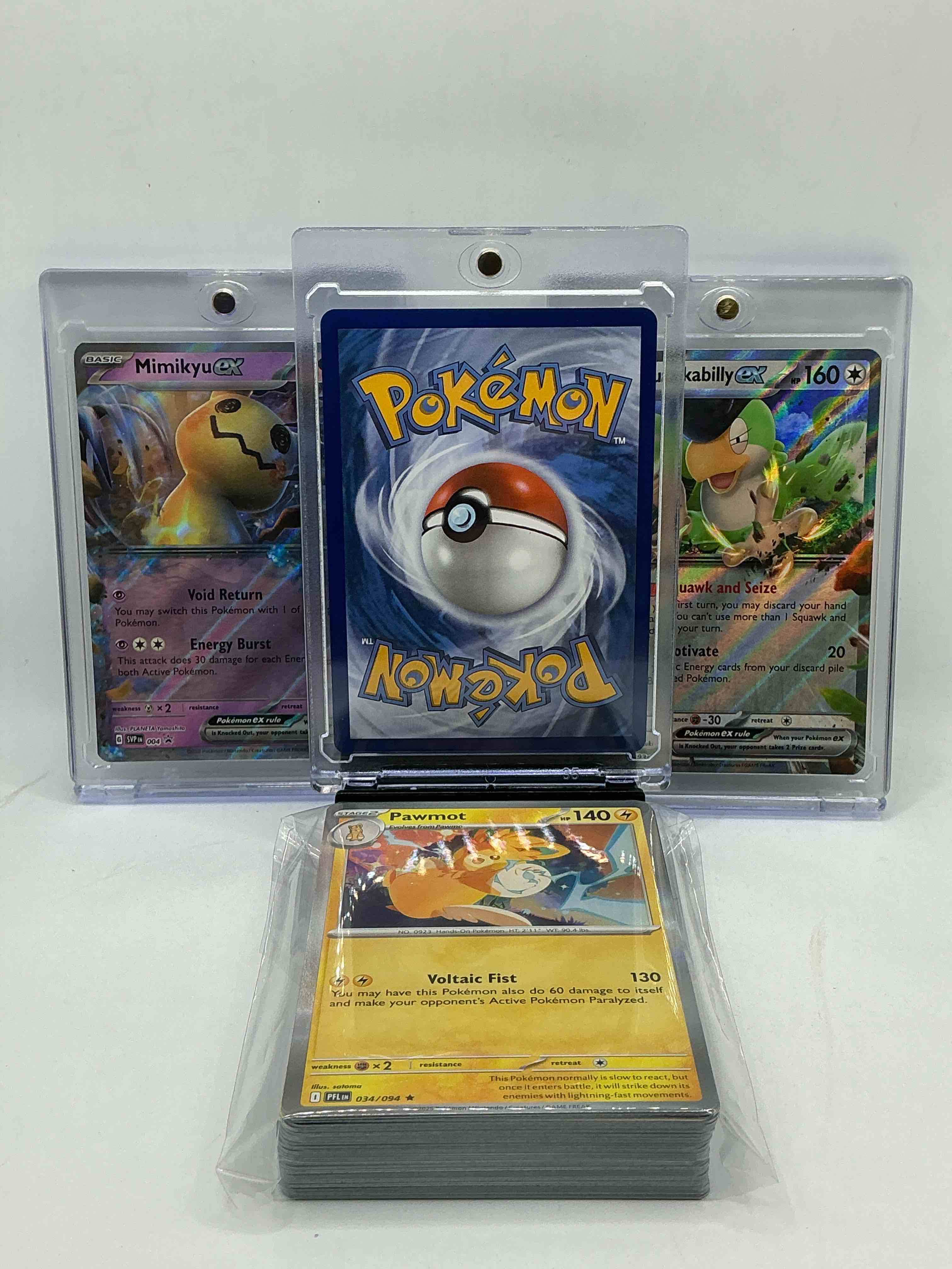 Condition photo showing New/Like New for kyurem ex! mimikyu ex! squawkabilly ex! along with 50 other pokémon heroes, holos, legends & commons- including holographic cards, stage 2 cards, holos in all forms & more! also includes 36 non holo common/ uncommon basic & first stage cards trainers & energy too! perfect set for collectors & enthusiasts!