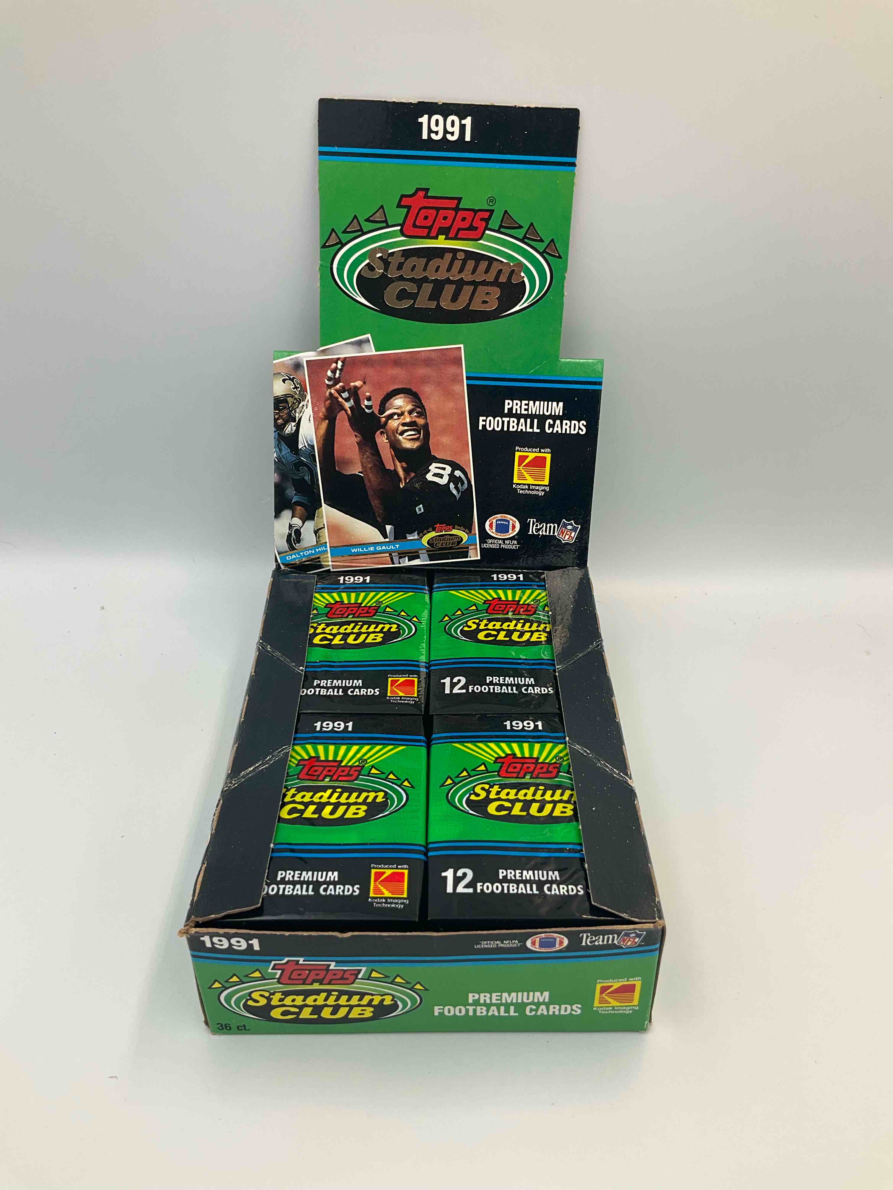 Condition photo showing New/Like New for rare! 1992 topps stadium club unopened wax pack, direct from original sealed retail case. sought after by collectors because each pack has a topps gold card! search for tons of stars like montana, rice, barry sanders, emmitt smith & so much more!