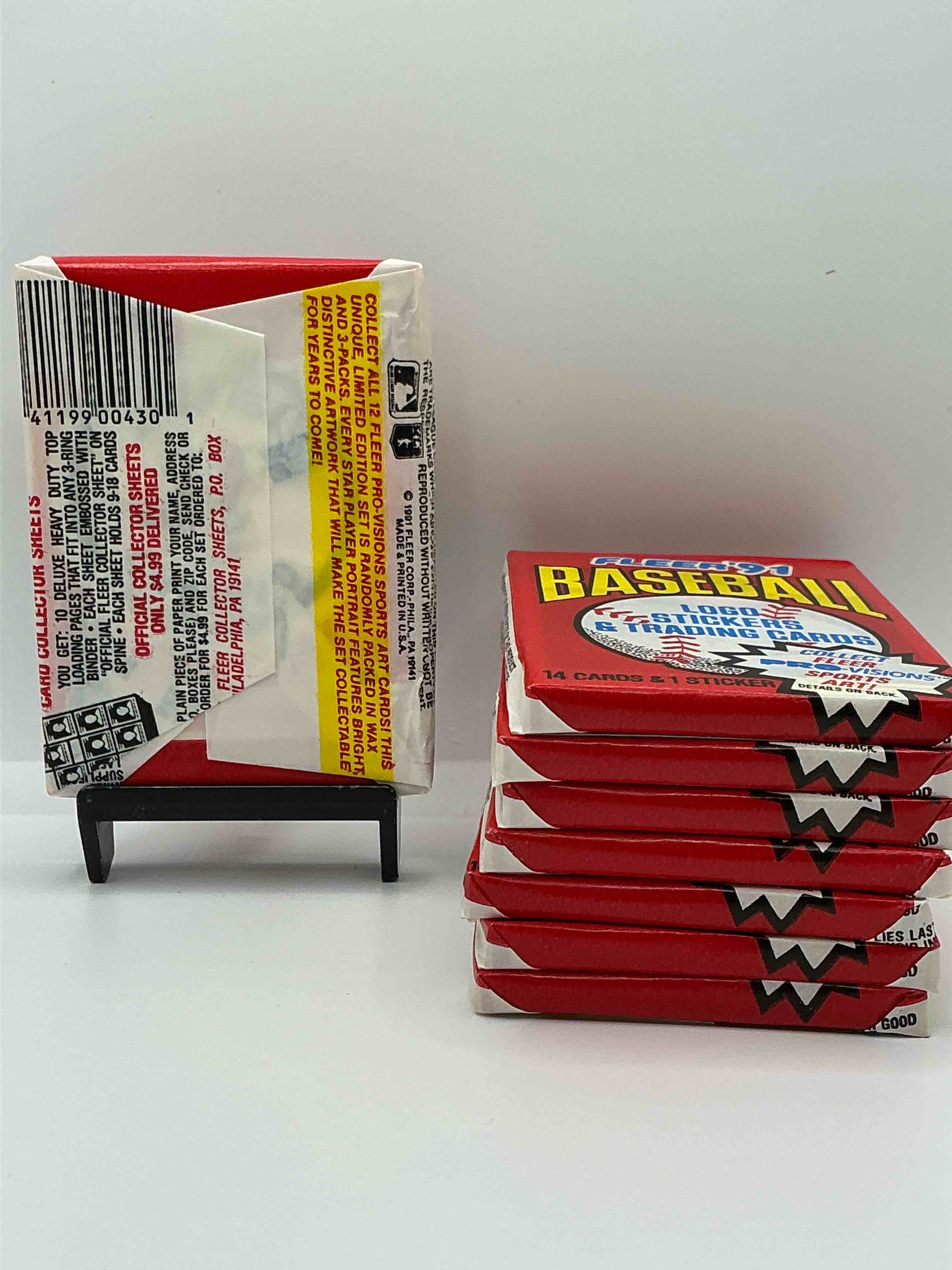 Condition photo showing New/Like New for 1991 fleer baseball unopened wax pack, direct from original sealed retail case search for griffey jr. & barry bonds "generation stars" combo card #710 (psa 10 value $200), nolan ryan, don mattingly & so much more!