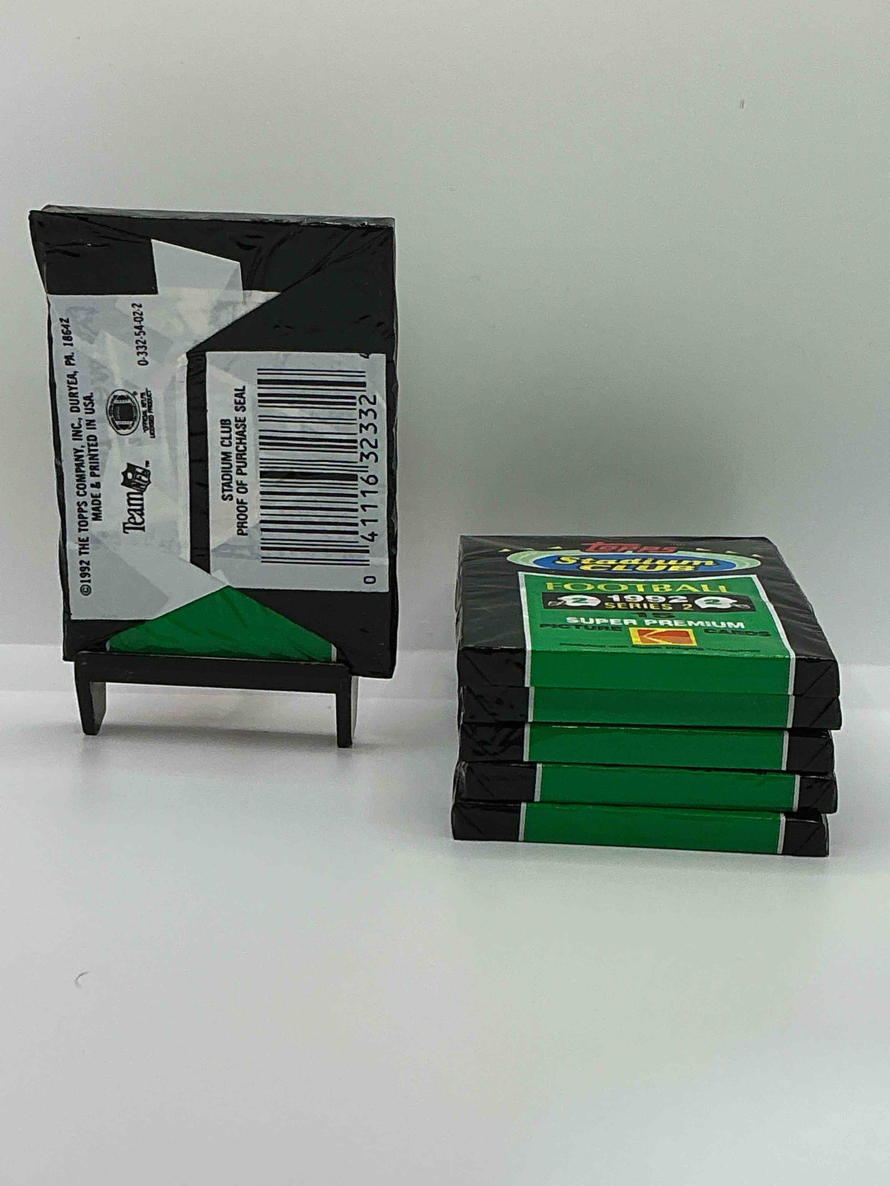 Condition photo showing New/Like New for brett favre insanity! 1992 topps stadium club unopened packs! these high end packs could have some awesome cards! topps super premium picture cards... with possible brett favre, mint 10 worth over $250! all direct from original box!