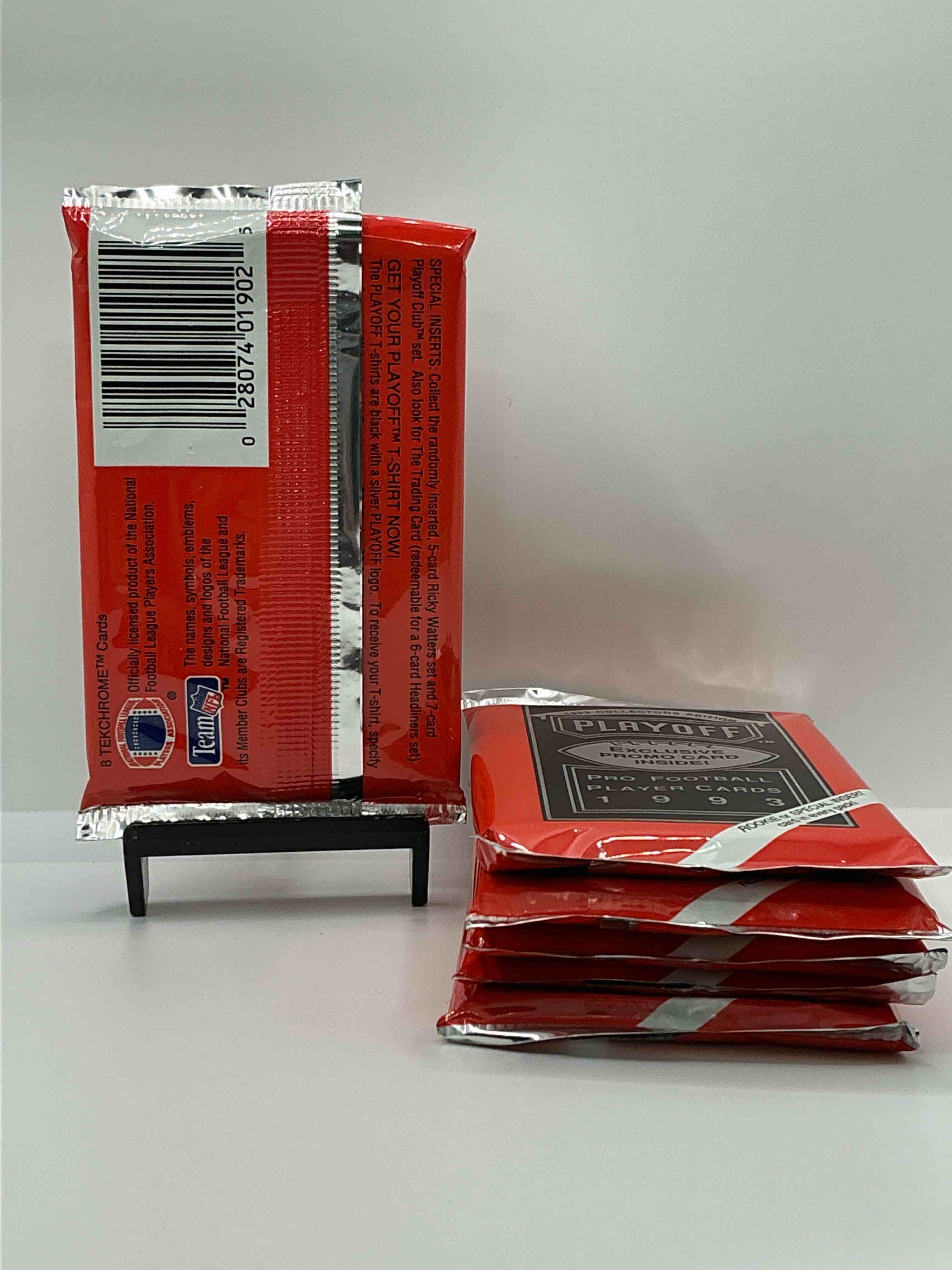 Condition photo showing New/Like New for beautiful & super rare 1993 playoff football unopened packs, direct from chrome display box! these packs have at least one special insert or rookie in each pack! search for troy aikman, emmitt smith, barry sanders, jerry rice & more!