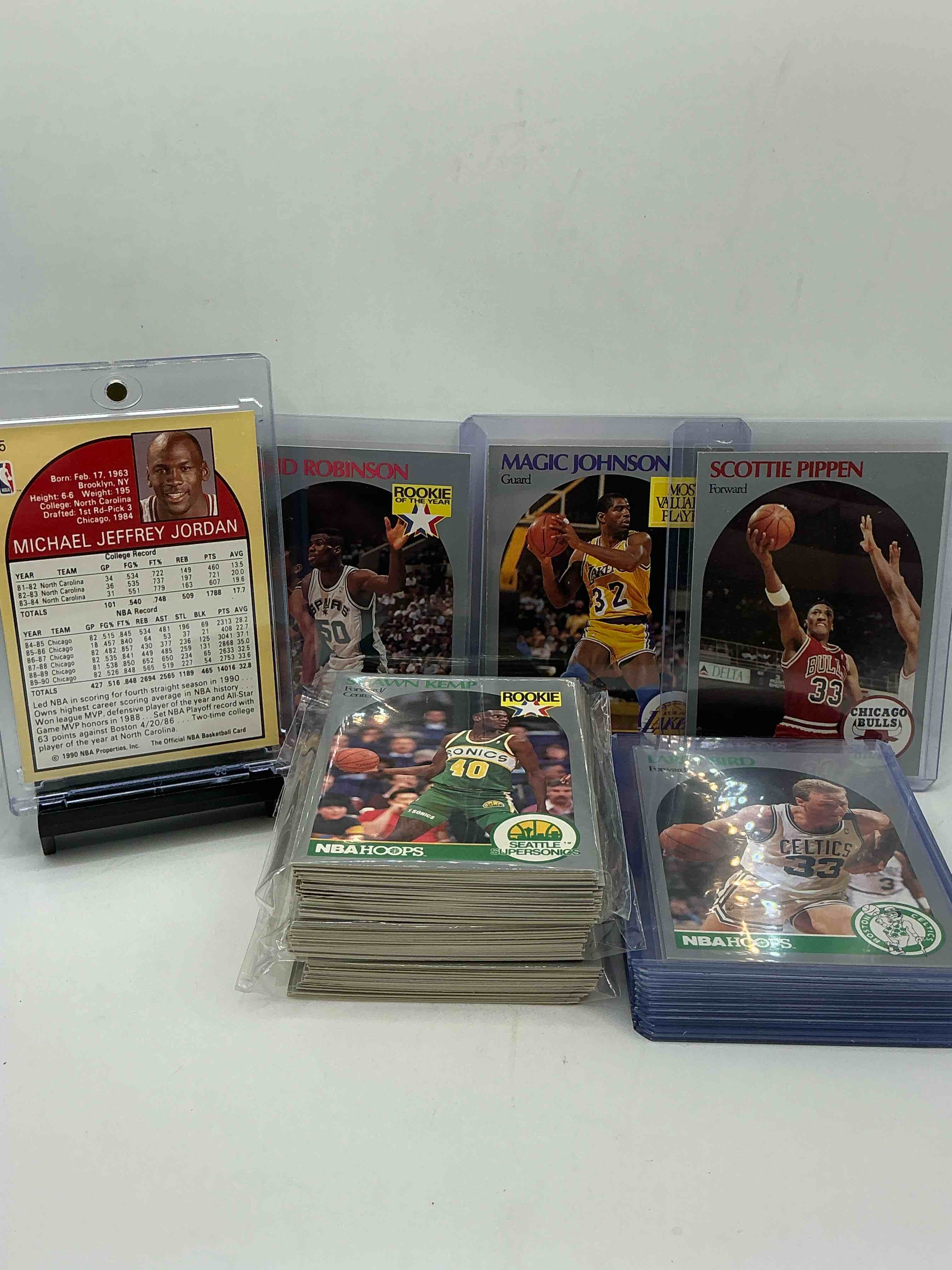 Condition photo showing New/Like New for michael jordan! 1990 nba hoops 100 card basketball! the best cards from the year! michael jordan, magic johnson, larry bird, scottie pippen, david robinson, charles barkley, karl malone, clyde drexler & more! all stars, hall of famers, champions & more, the perfect mix of miscellaneous '90 nba variety!