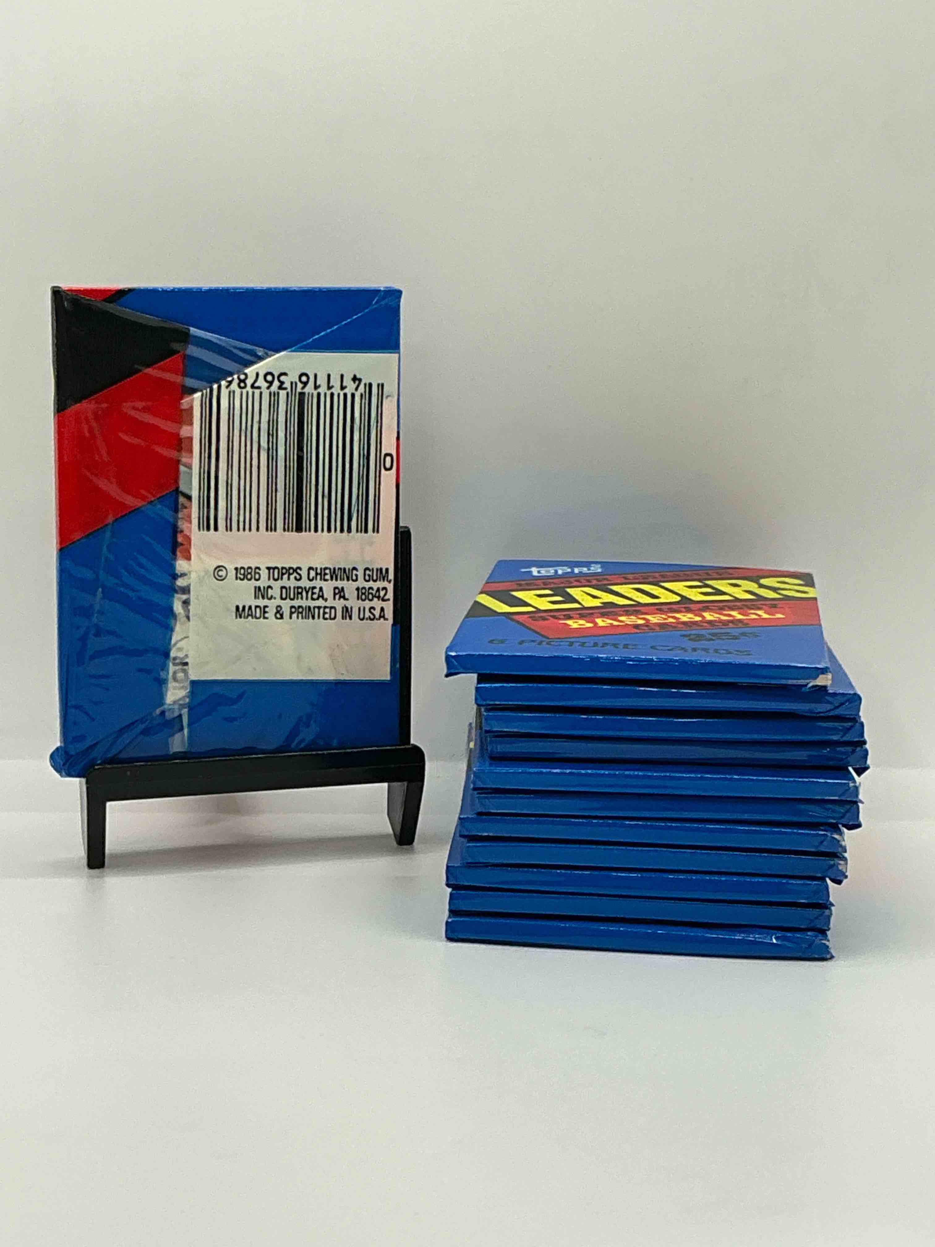Condition photo showing New/Like New for ultra rare! 1986 "mlb leaders" unopened miniature baseball collectible card packs, 6 cards per pack, direct from original retail case. super rare, impossible to find! like new condition!