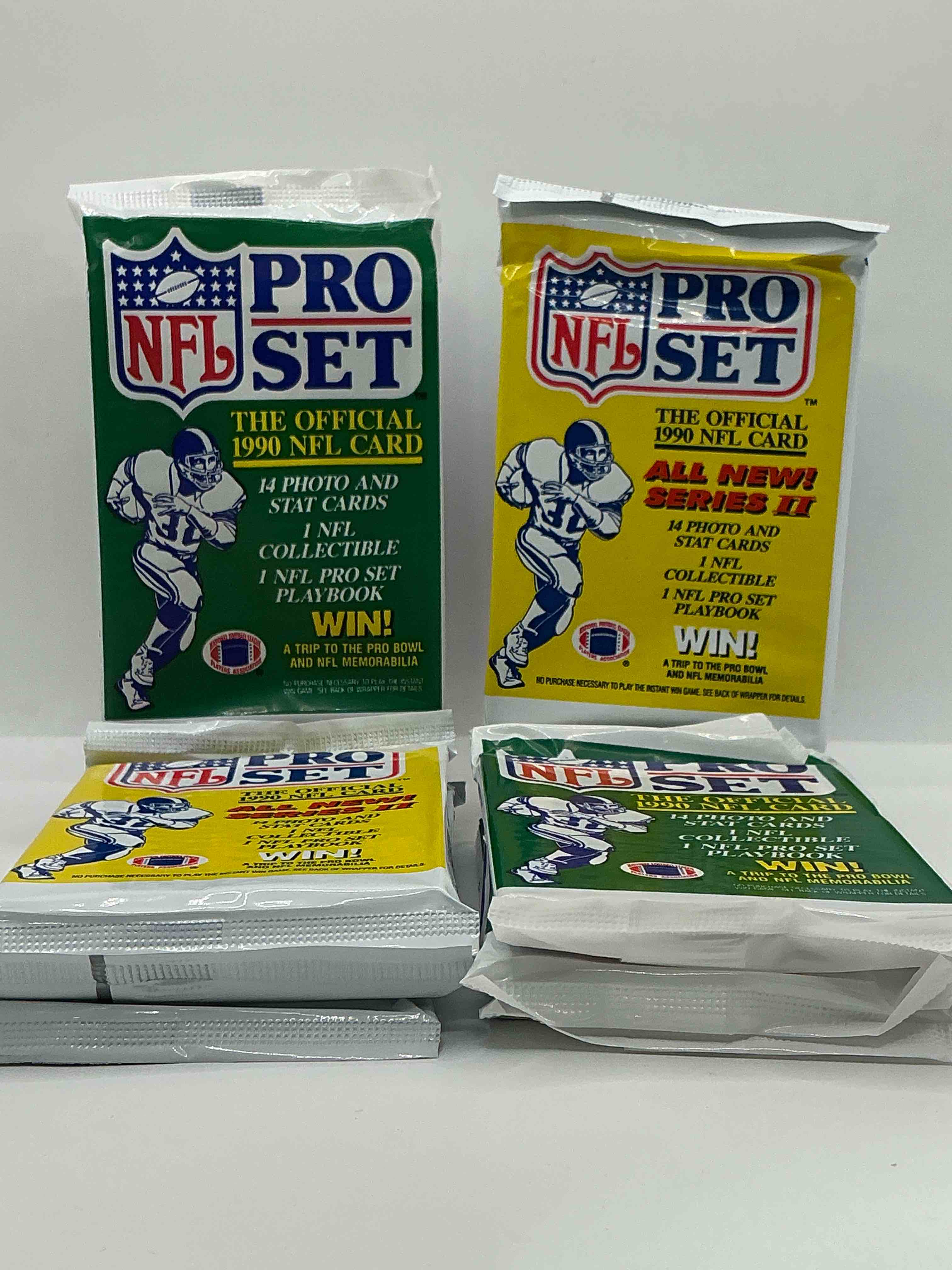 Condition photo showing New/Like New for wow! 1990 pro set football sealed card packs, series i & ii, direct from original retail case!highly sought after by collectors as this year is loaded with high profile cards!search for cards from barry sanders, deion sanders, troy aikman, michael irvin & much more! getting hard to find!